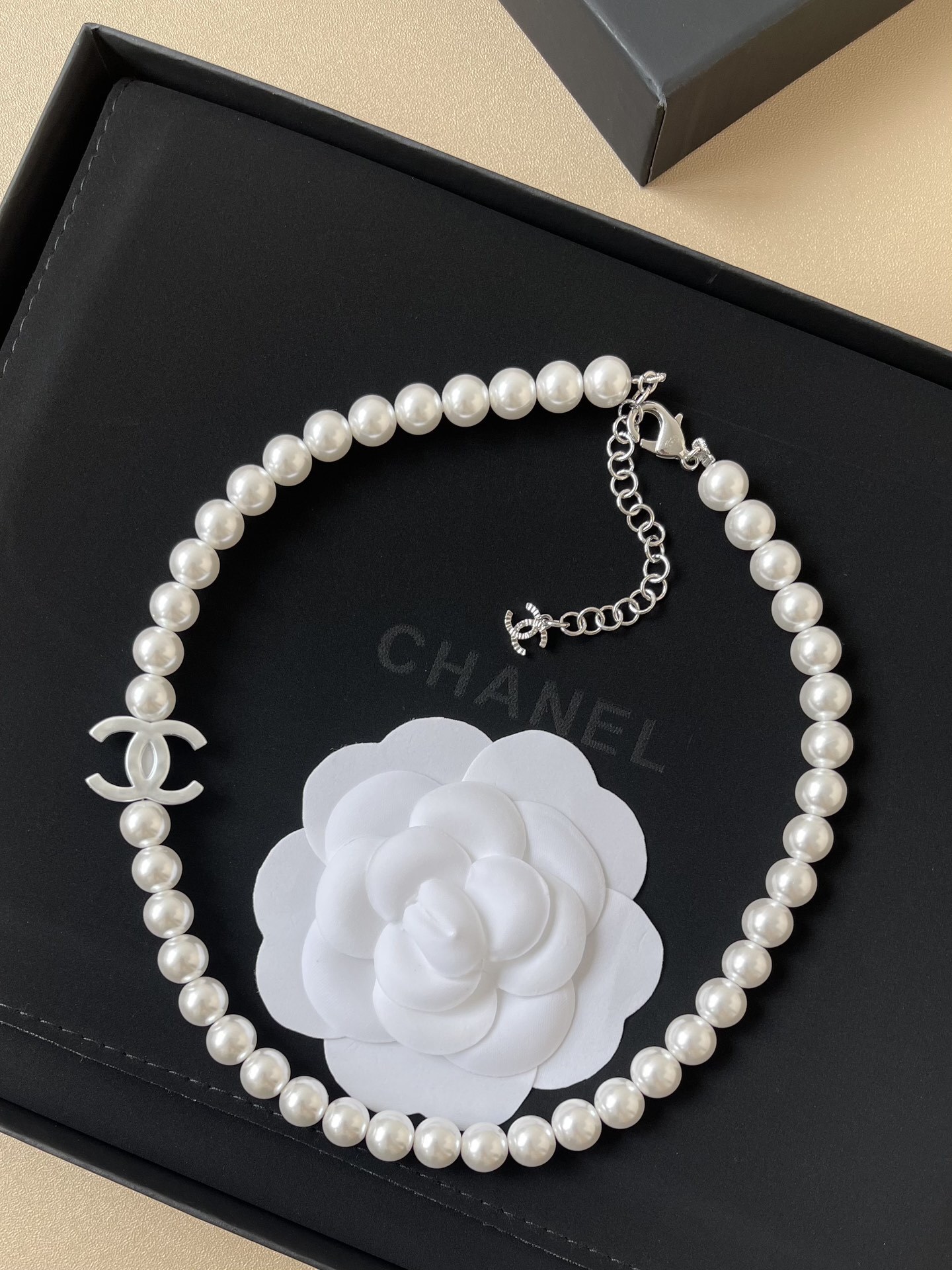 Elegant Pearl Necklace with Iconic CC Logo Charm