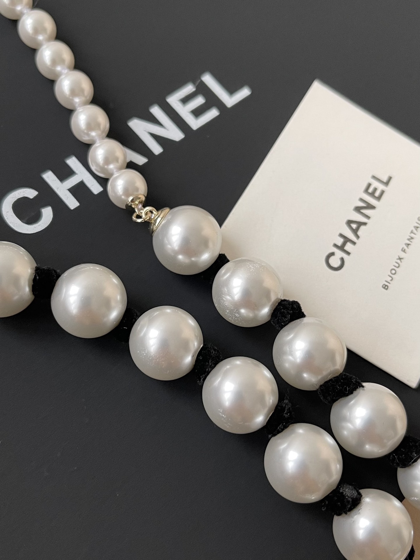 Chanel 2025 SS Long Pearl Necklace with Black CC Logo Charm