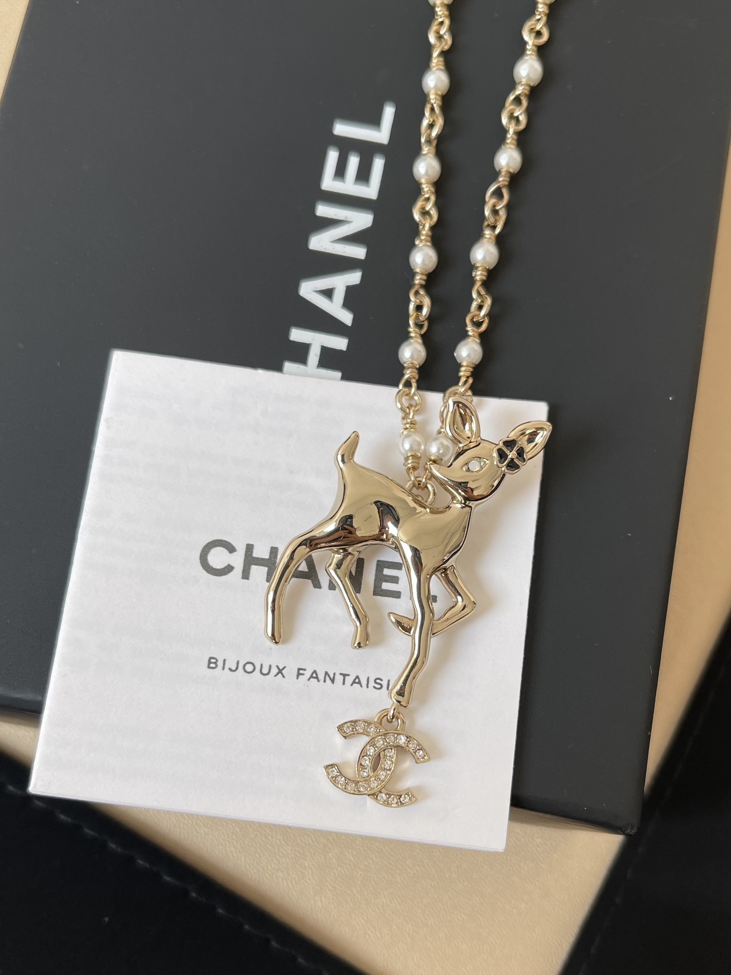 Chanel Gold Fawn Deer Necklace with Pearl Chain and CC Logo