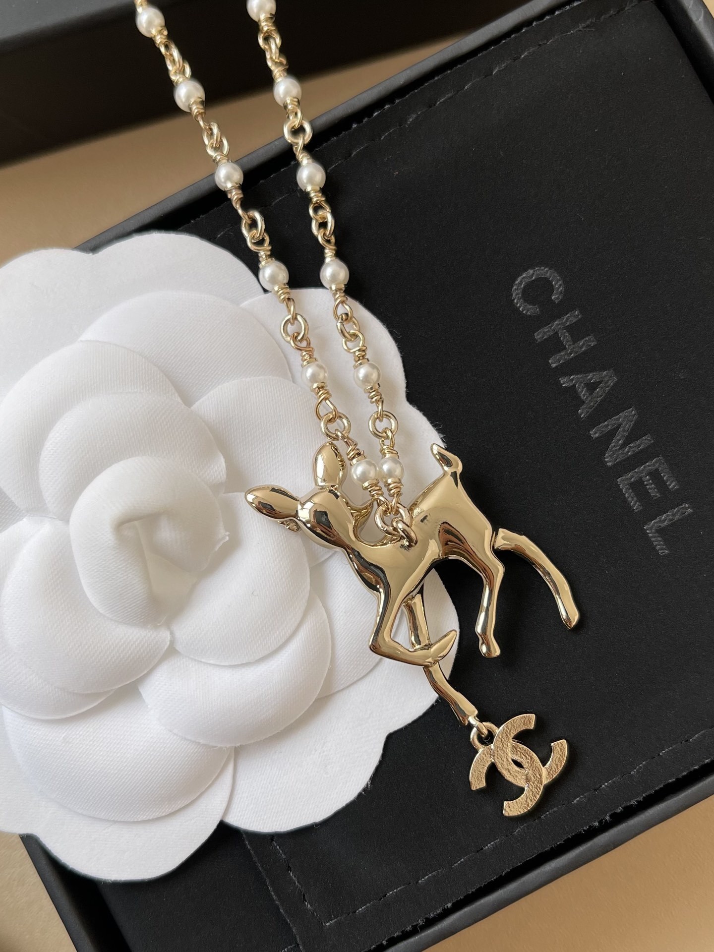 Chanel Gold Fawn Deer Necklace with Pearl Chain and CC Logo