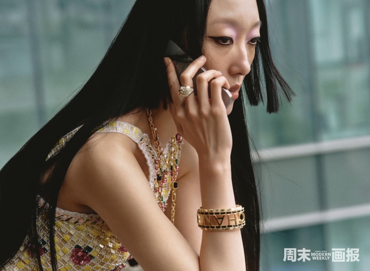 Luxury Chanel Gold-Tone Logo Cuff Bracelet with Black & White Stones
