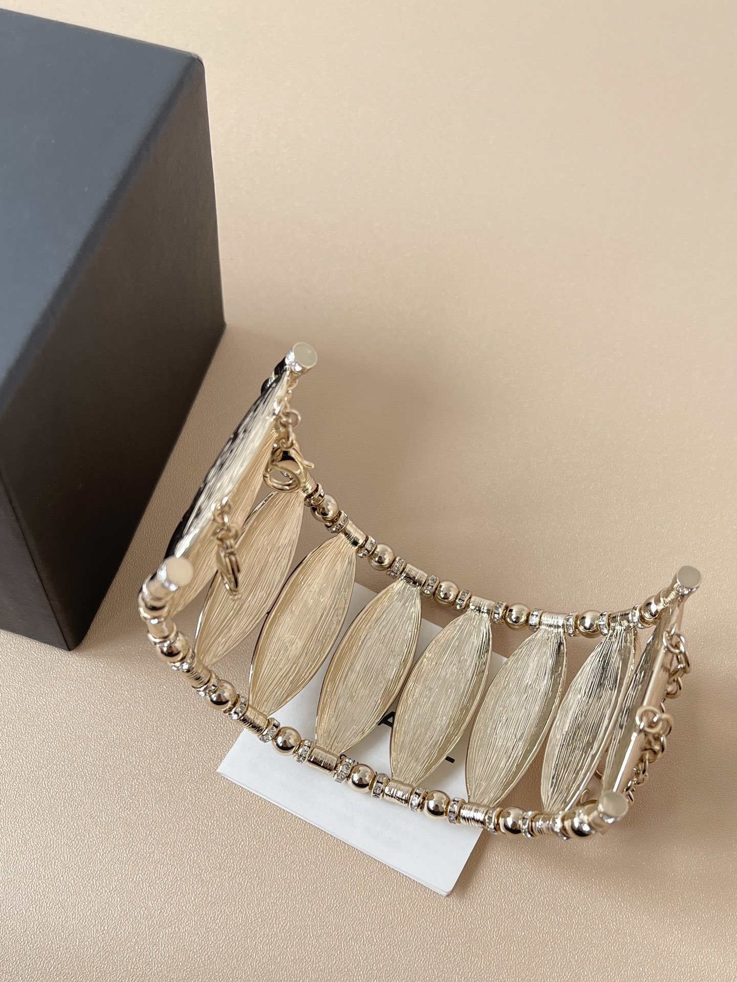 Chanel Luxury Gold Leaf Cuff Bracelet with Rhinestone CC Logo