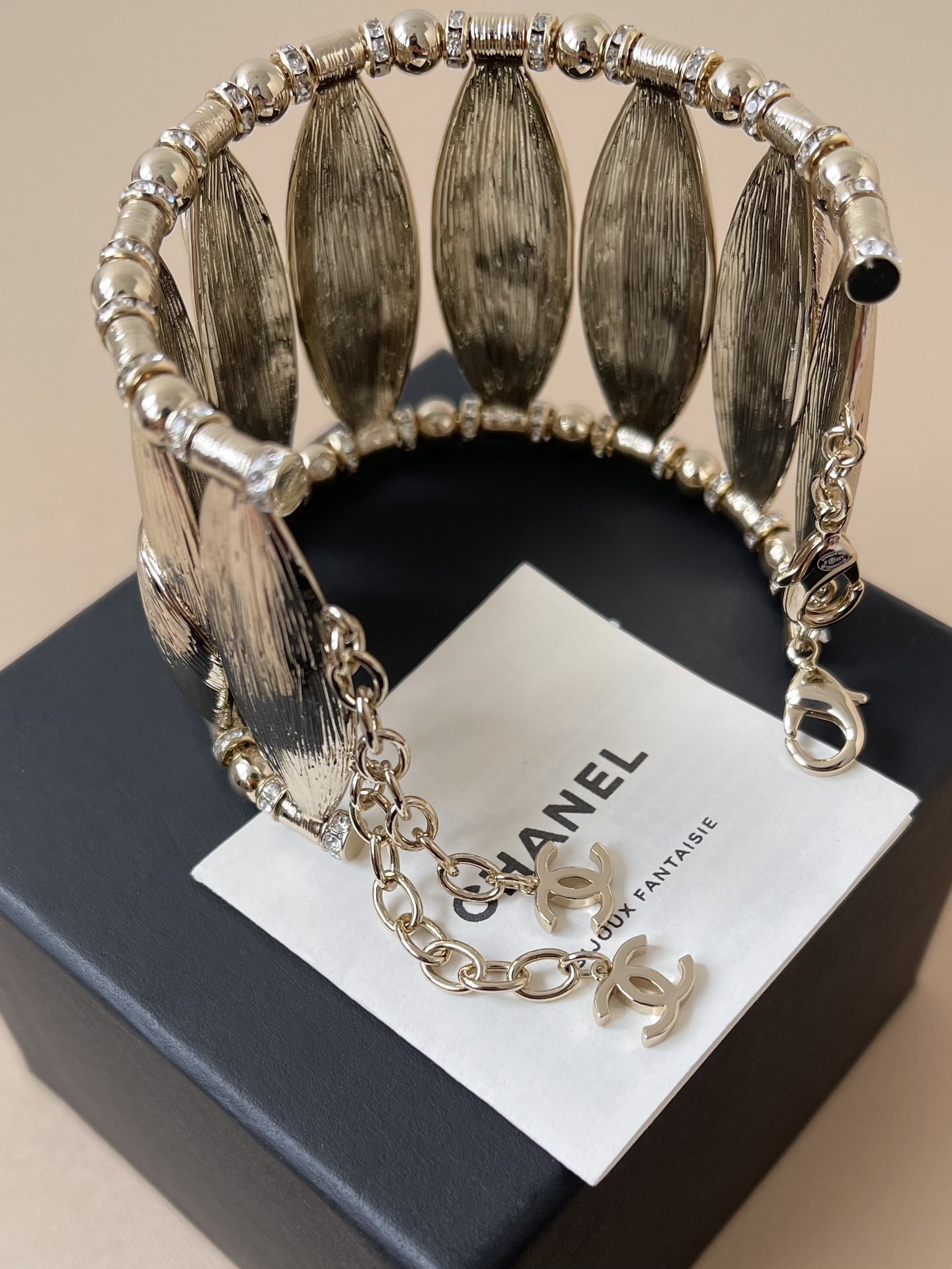 Chanel Luxury Gold Leaf Cuff Bracelet with Rhinestone CC Logo