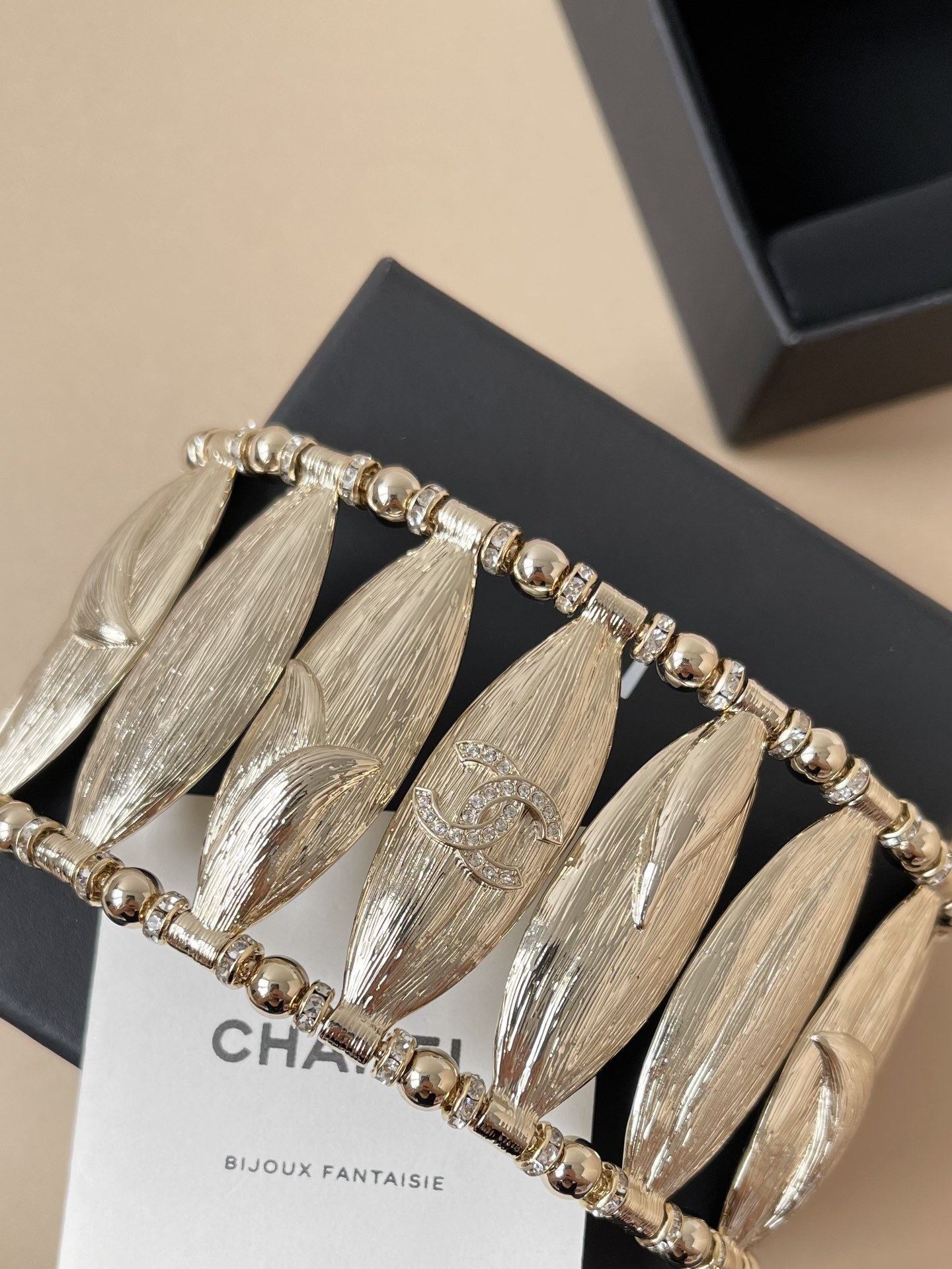 Chanel Luxury Gold Leaf Cuff Bracelet with Rhinestone CC Logo