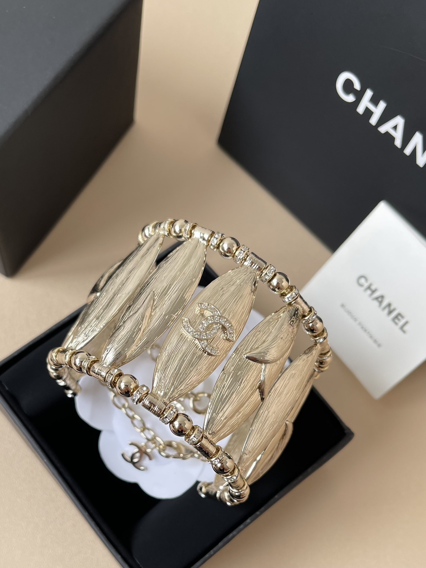 Chanel Luxury Gold Leaf Cuff Bracelet with Rhinestone CC Logo