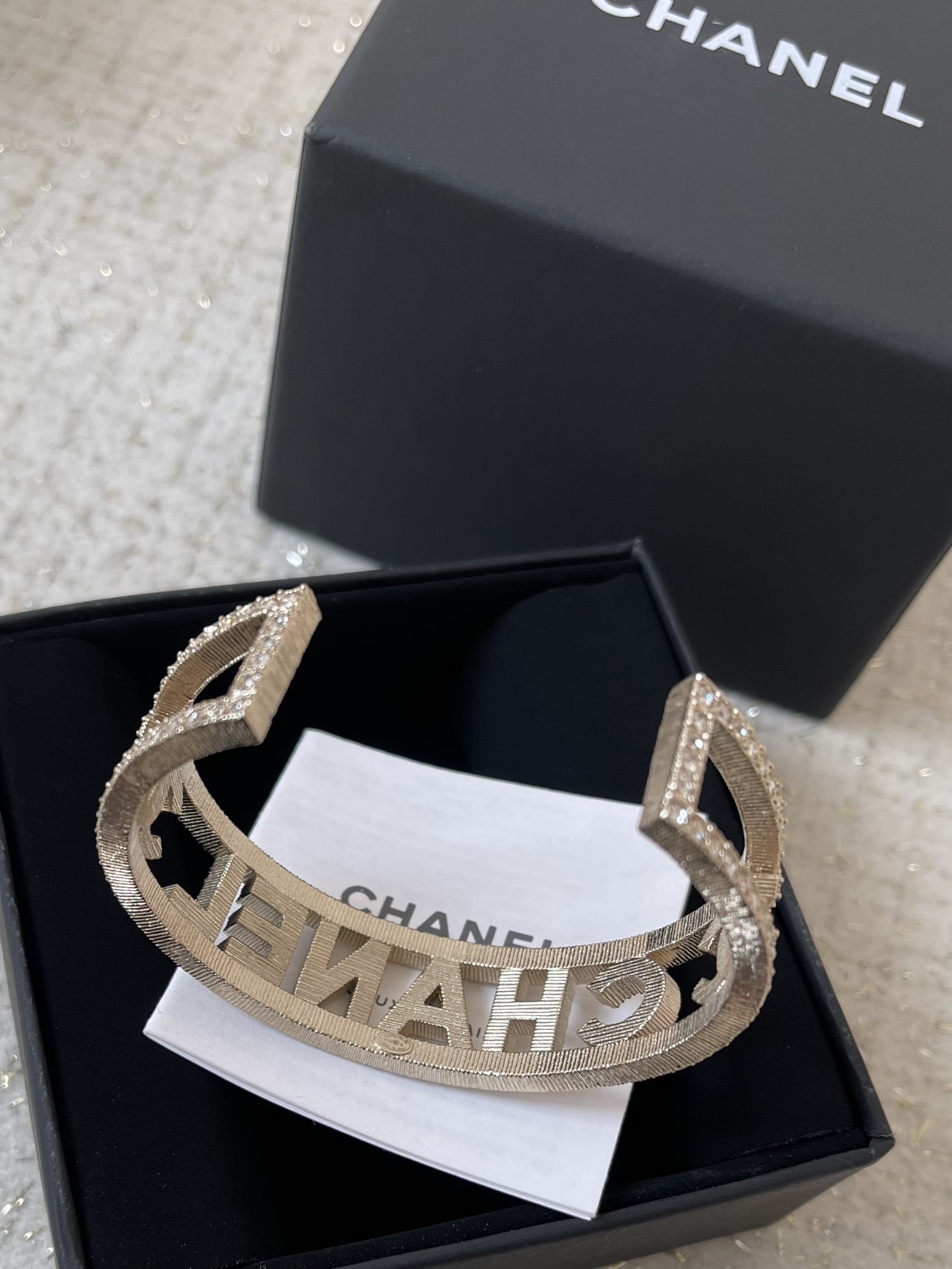 Chanel Metal & Rhinestone Wide Cuff Bracelet - Elegant Gold Tone