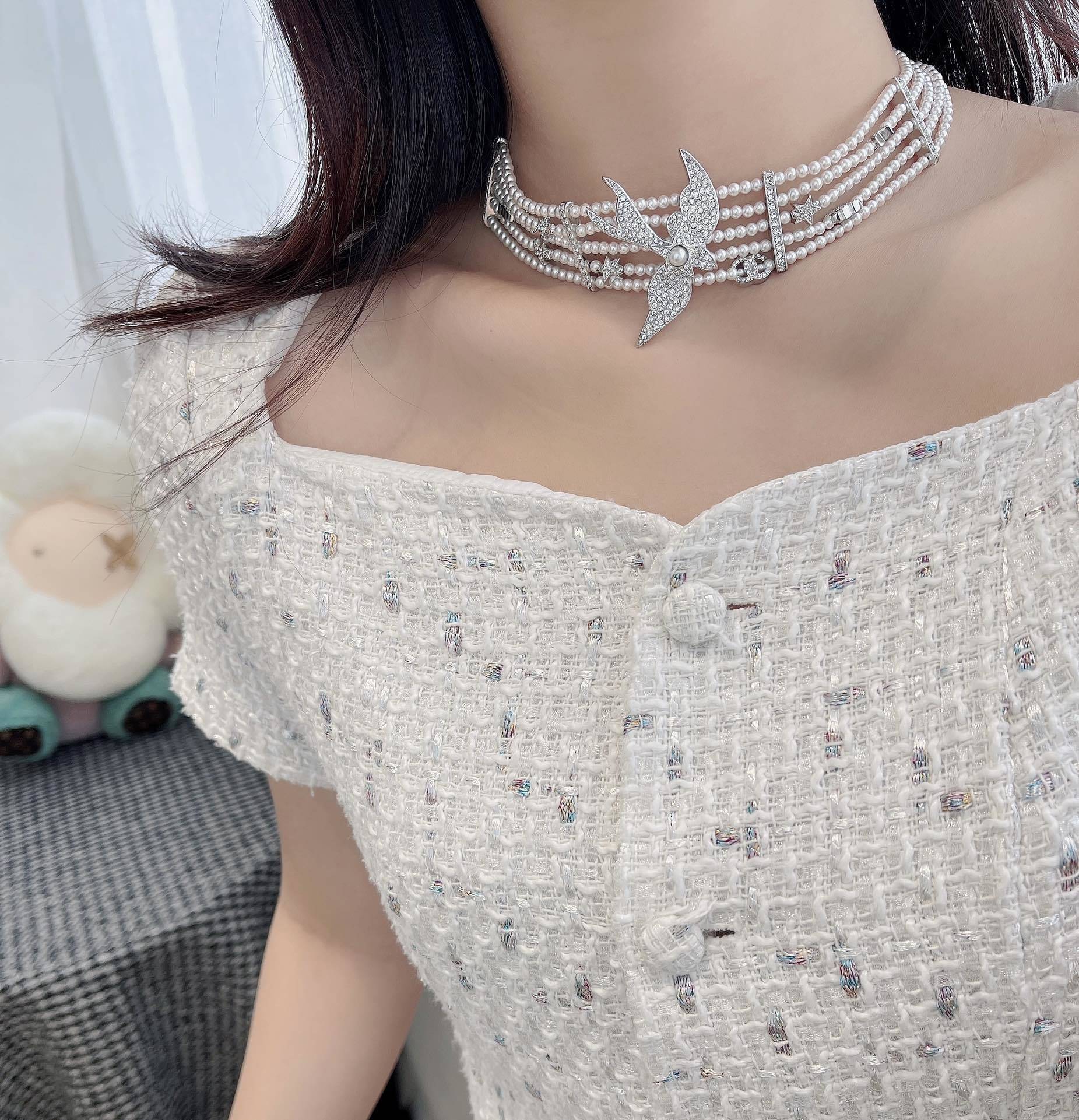 Chanel 2025 SS Pearl Choker Necklace with Crystal Swallow Motif