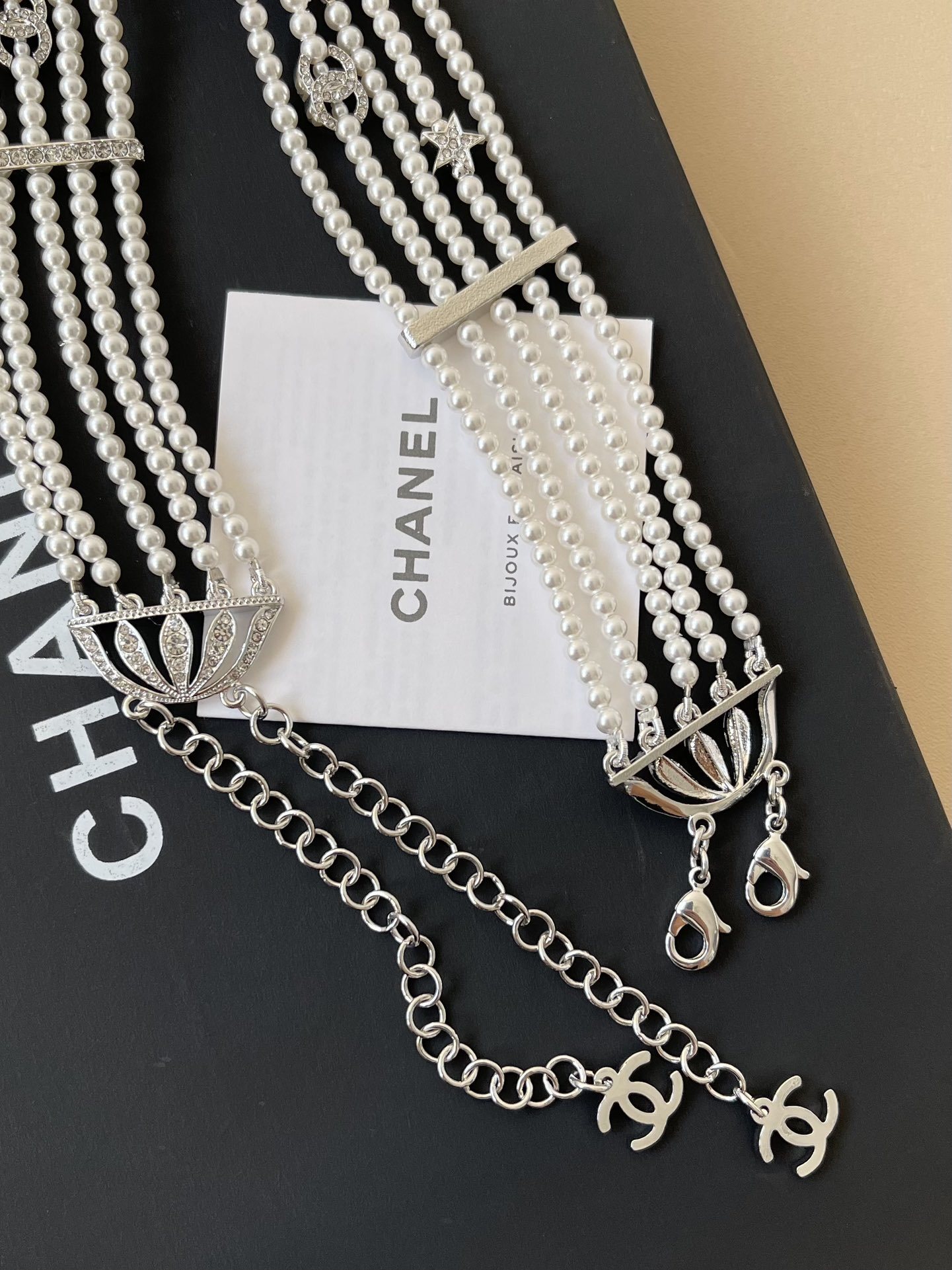 Chanel 2025 SS Pearl Choker Necklace with Crystal Swallow Motif