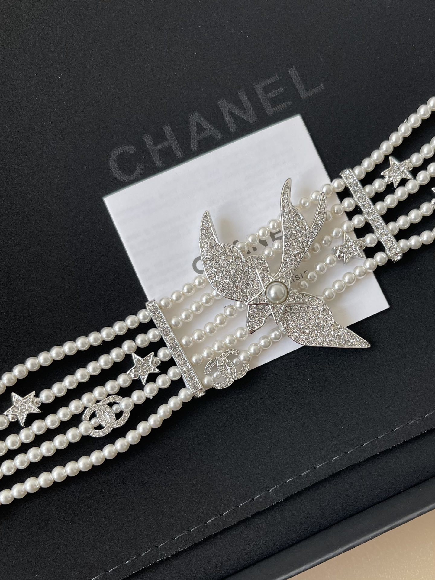 Chanel 2025 SS Pearl Choker Necklace with Crystal Swallow Motif