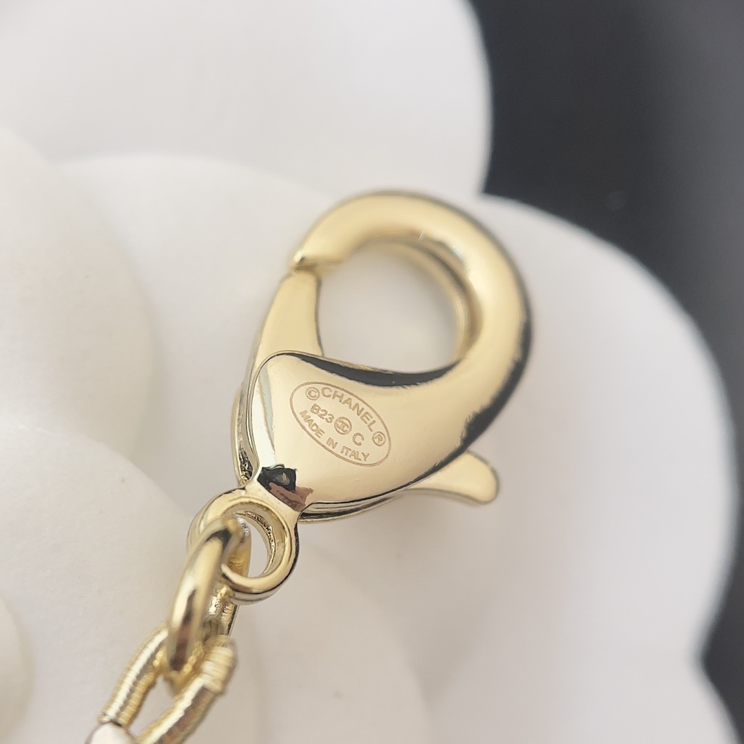 Luxury Chanel Black & White CC Logo Long Beaded Necklace