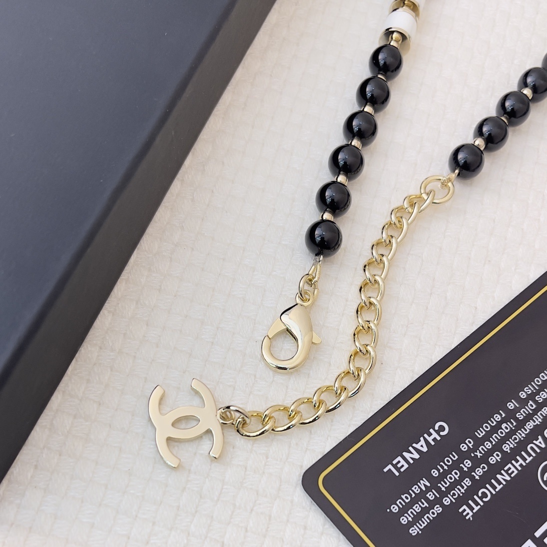 Luxury Chanel Black & White CC Logo Long Beaded Necklace