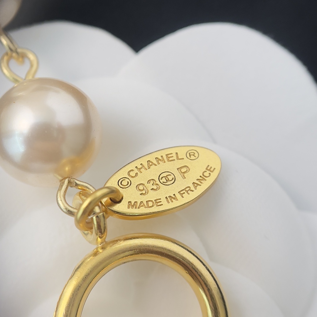 Luxury Long Pearl Necklace with Gold CC Logo Medallions