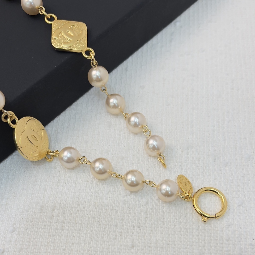Luxury Long Pearl Necklace with Gold CC Logo Medallions