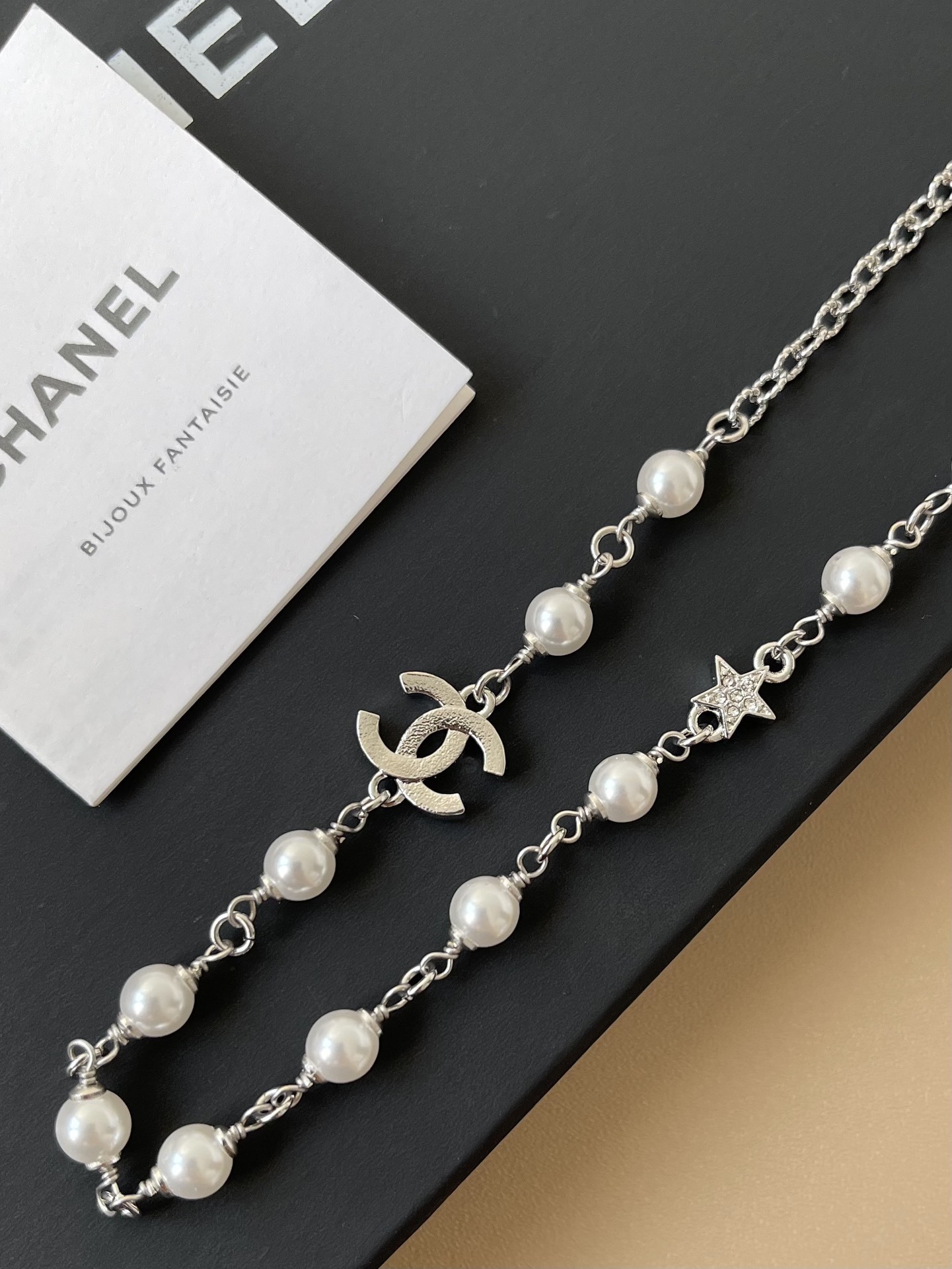 Luxury Chanel Pearl Necklace with Crystal CC Logo & Star Charm