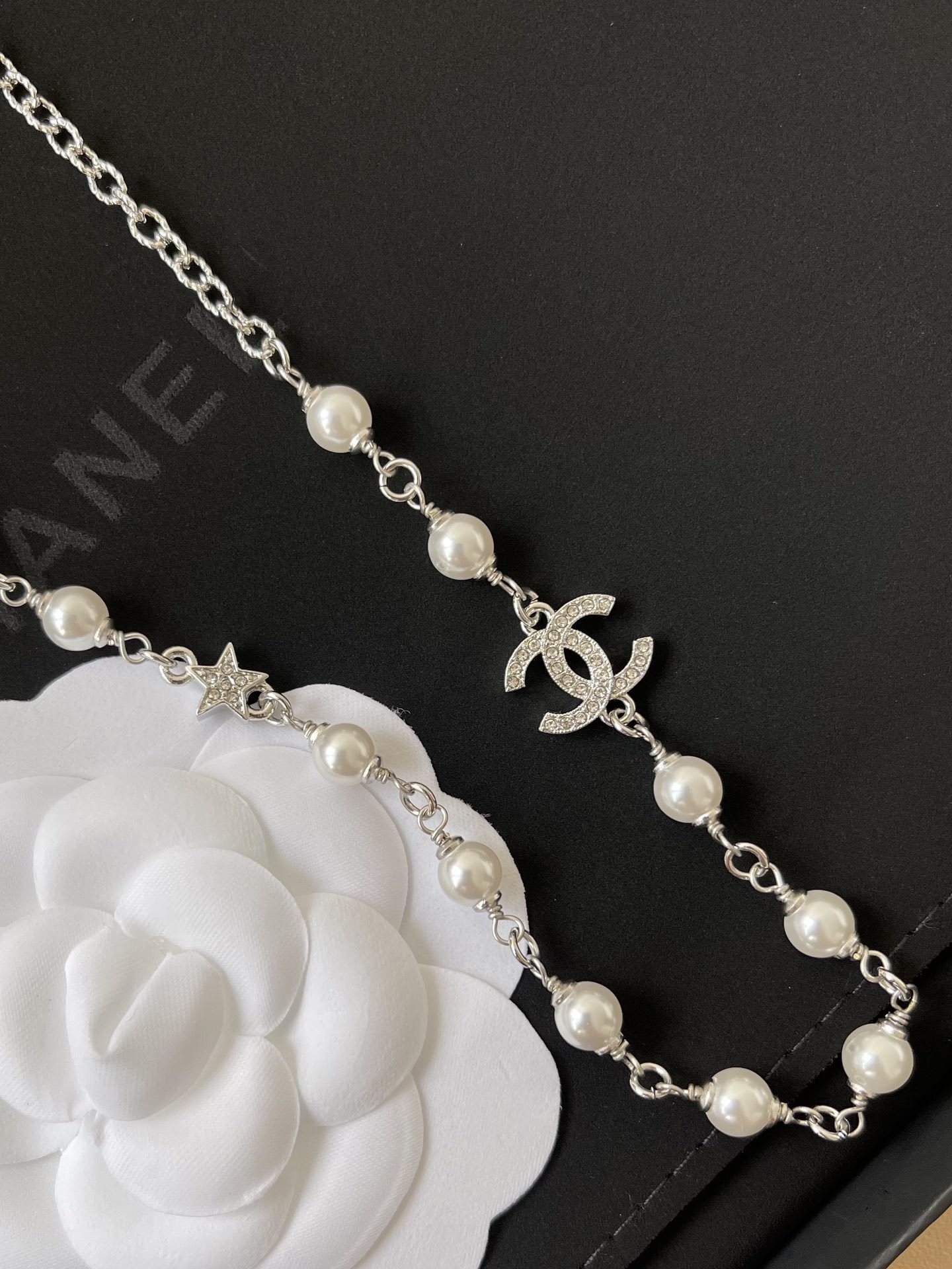 Luxury Chanel Pearl Necklace with Crystal CC Logo & Star Charm