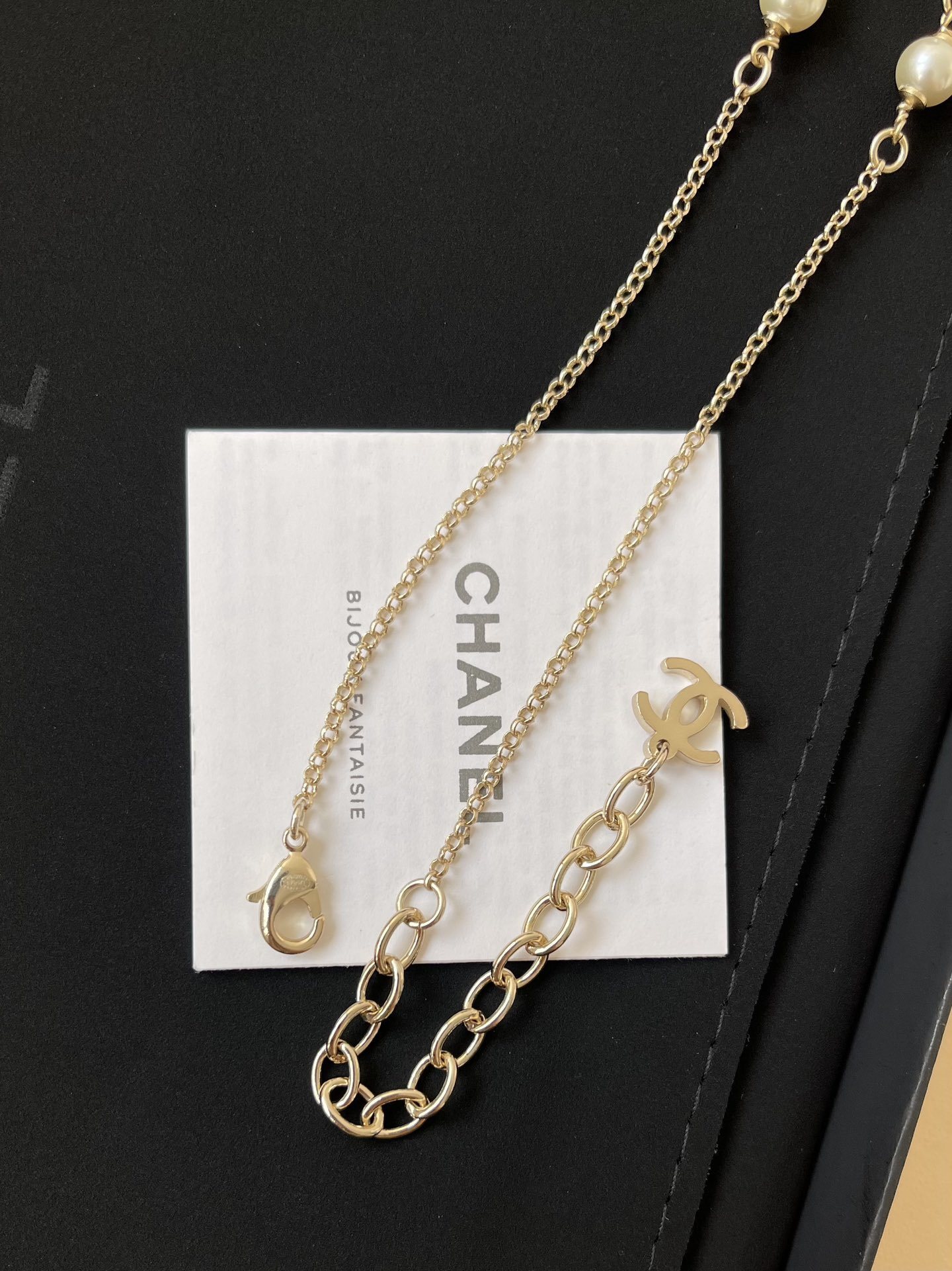 Luxury Chanel Gold-Tone Pearl Long Necklace with CC Logo & Leaves
