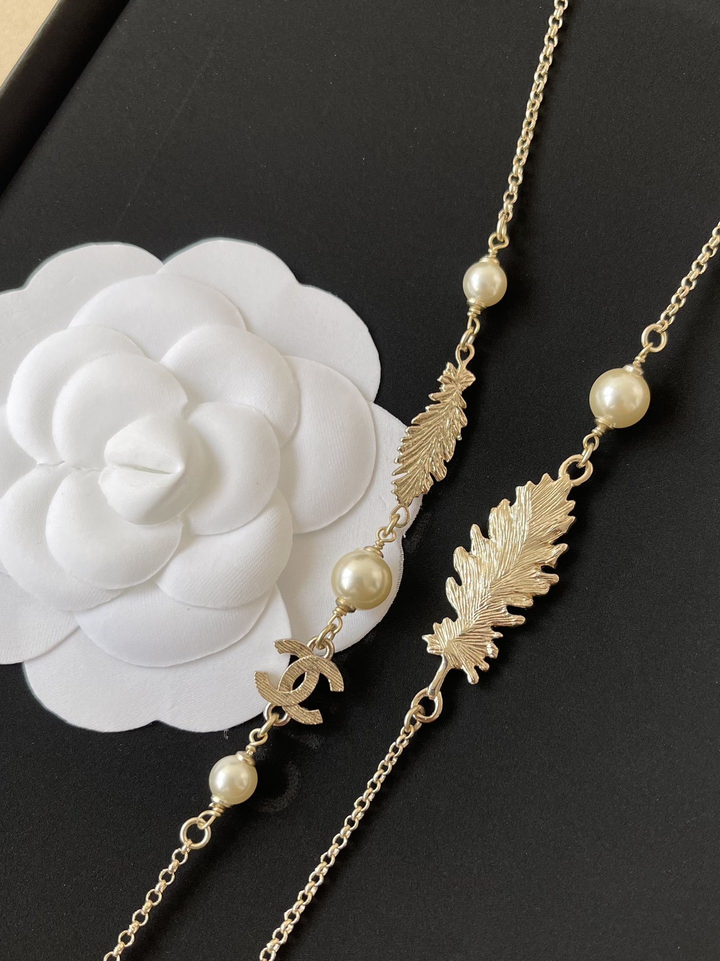 Luxury Chanel Gold-Tone Pearl Long Necklace with CC Logo & Leaves