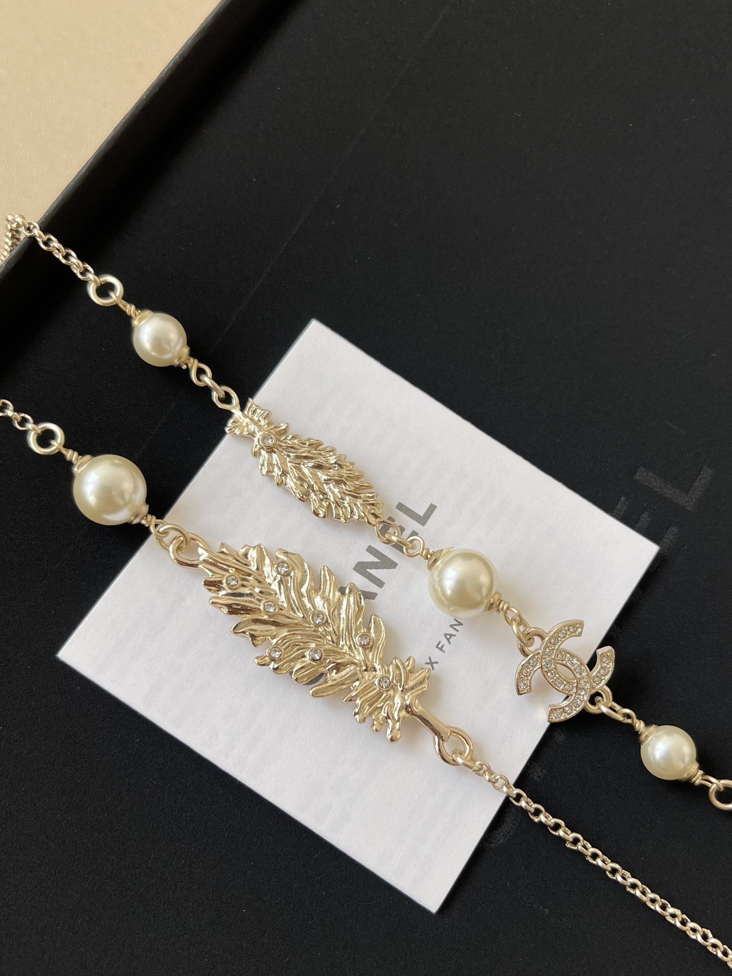 Luxury Chanel Gold-Tone Pearl Long Necklace with CC Logo & Leaves