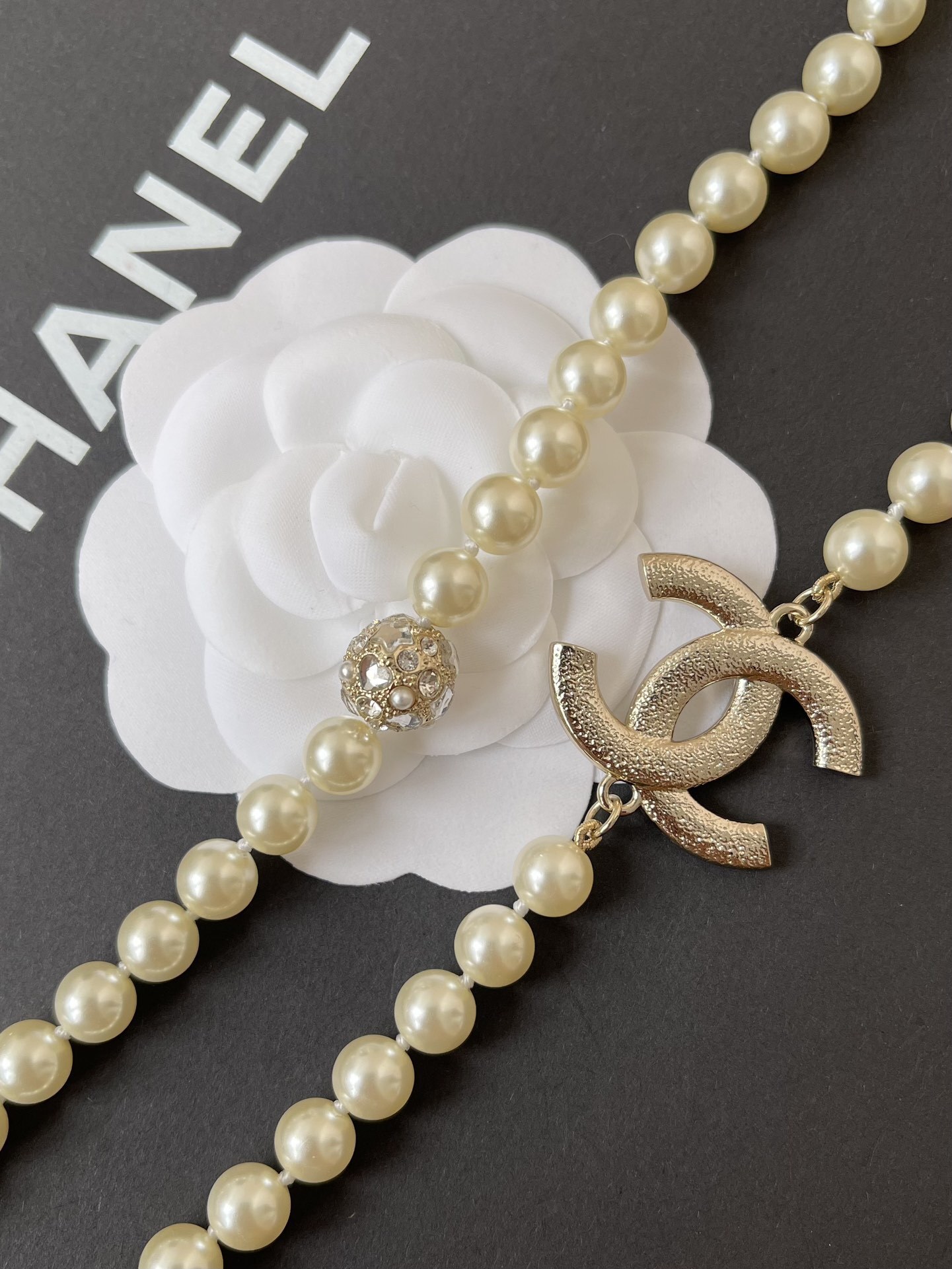 Chanel Luxury Long Pearl Necklace with Crystal CC Logo Charm