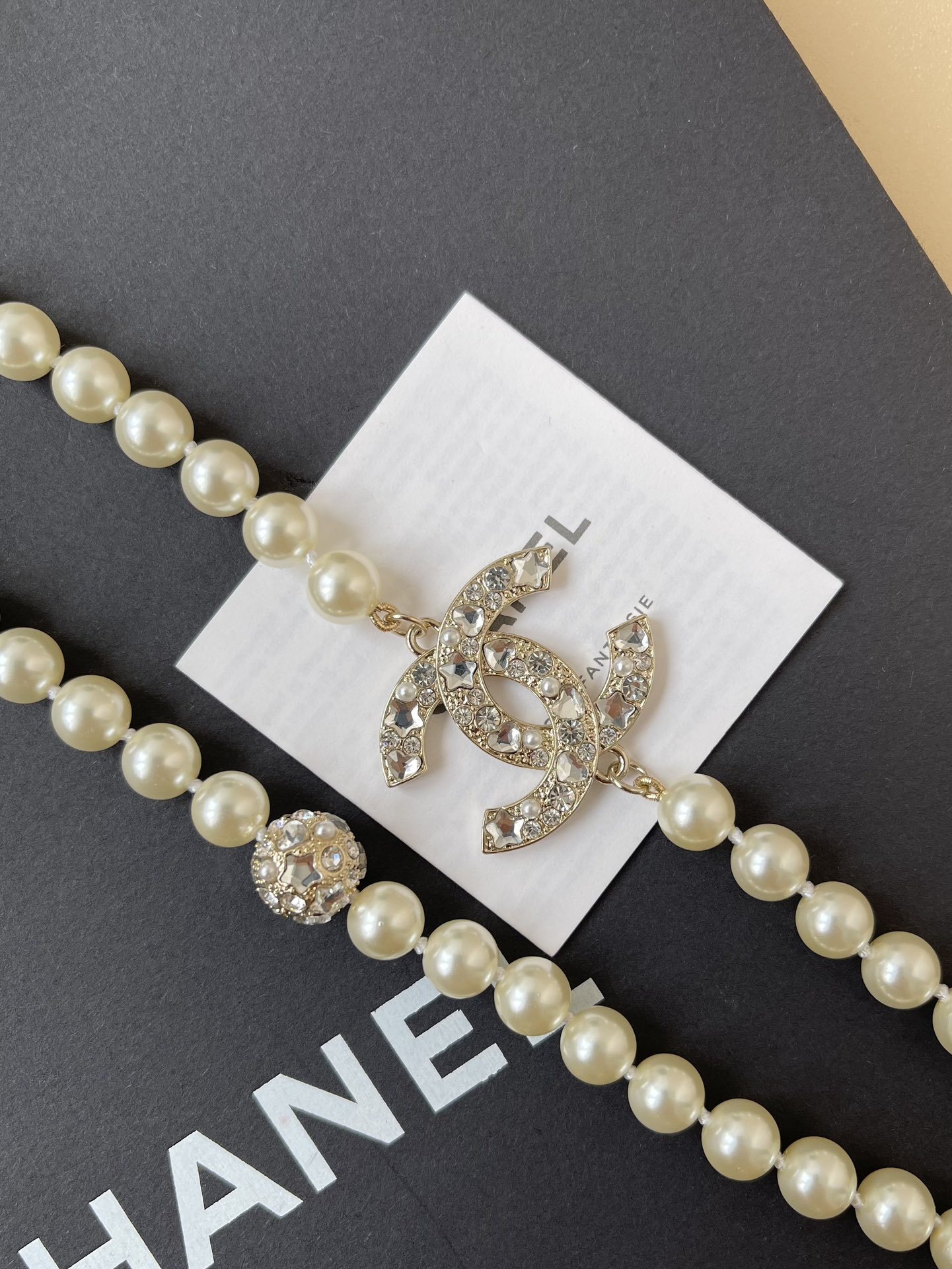 Chanel Luxury Long Pearl Necklace with Crystal CC Logo Charm