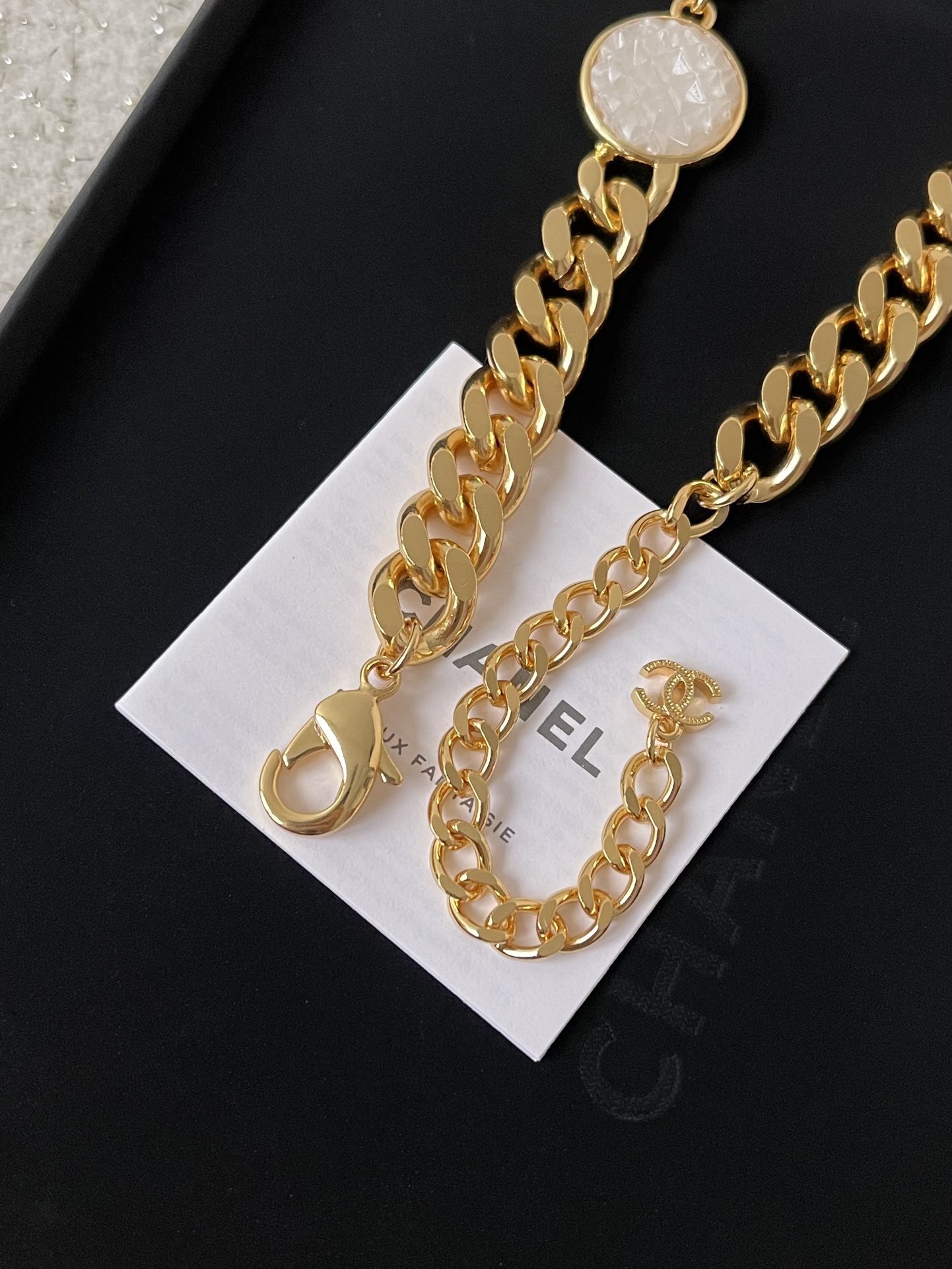 Elegant CC Logo Gold Chain Necklace with White Textured Inlay