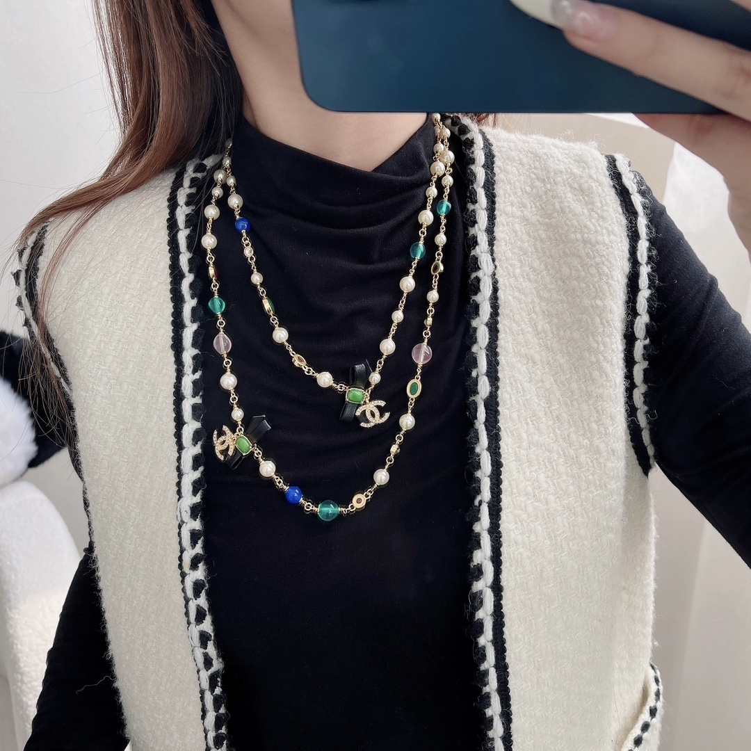 Luxury Long Pearl Necklace with Bow Accents and Colorful Charms