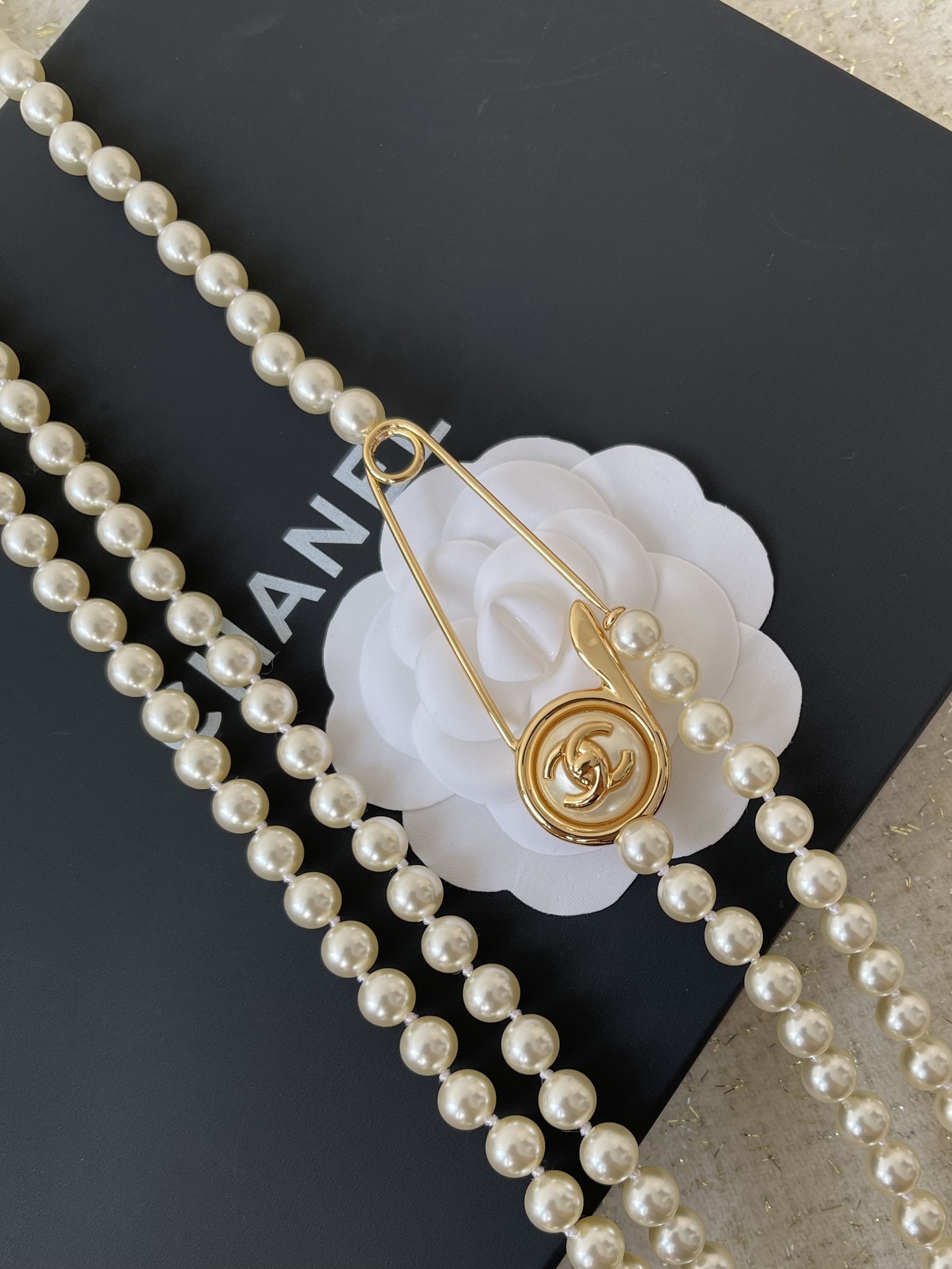 Luxury Chanel Long Pearl Necklace with CC Logo Safety Pin Clasp