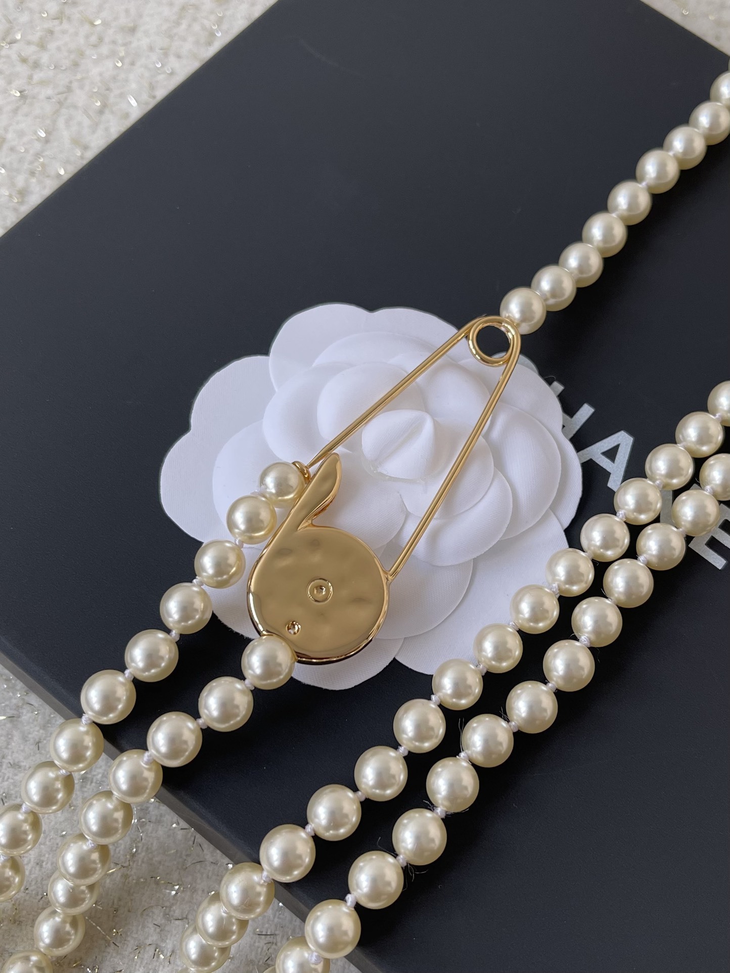 Luxury Chanel Long Pearl Necklace with CC Logo Safety Pin Clasp