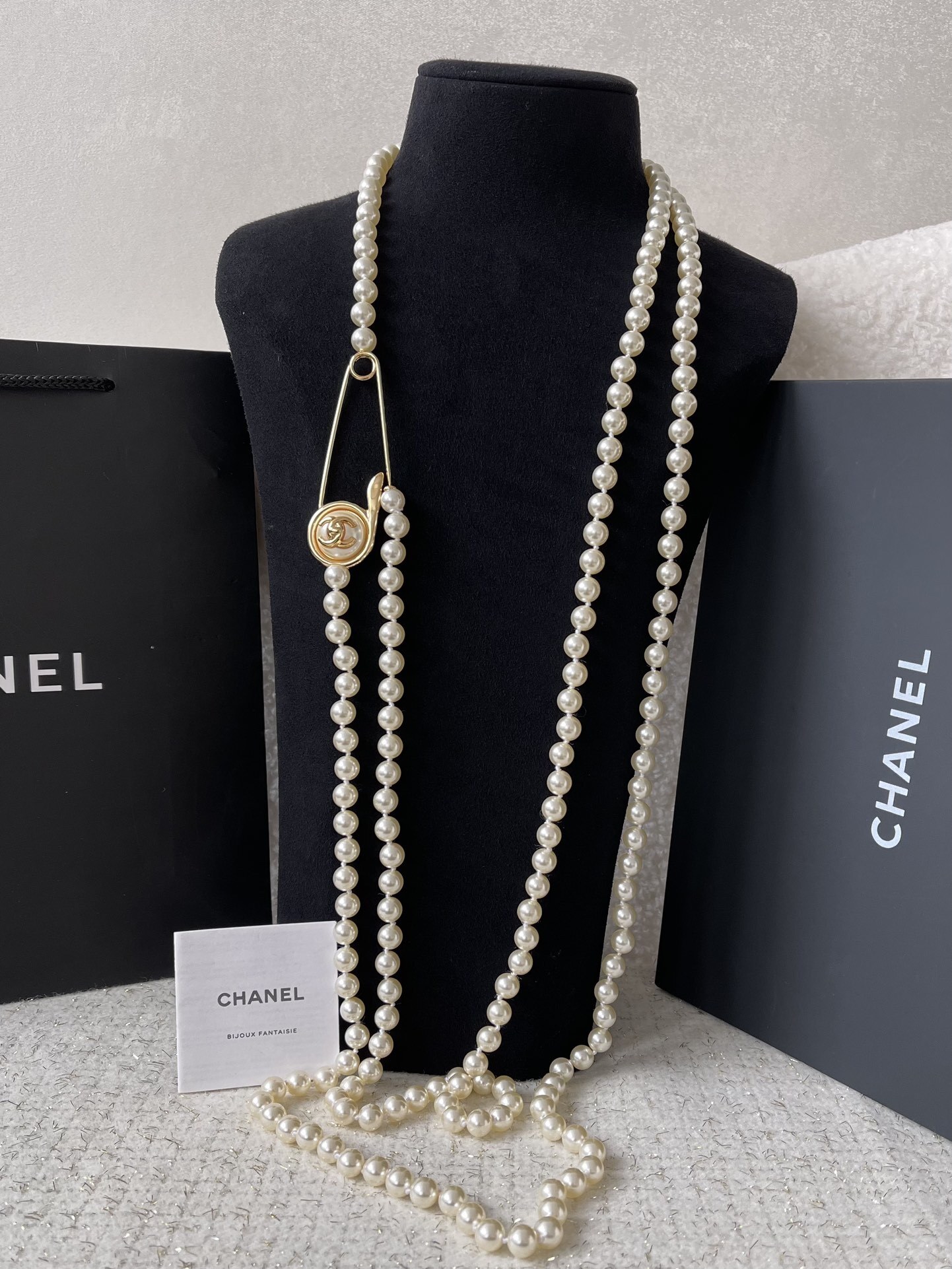 Luxury Chanel Long Pearl Necklace with CC Logo Safety Pin Clasp