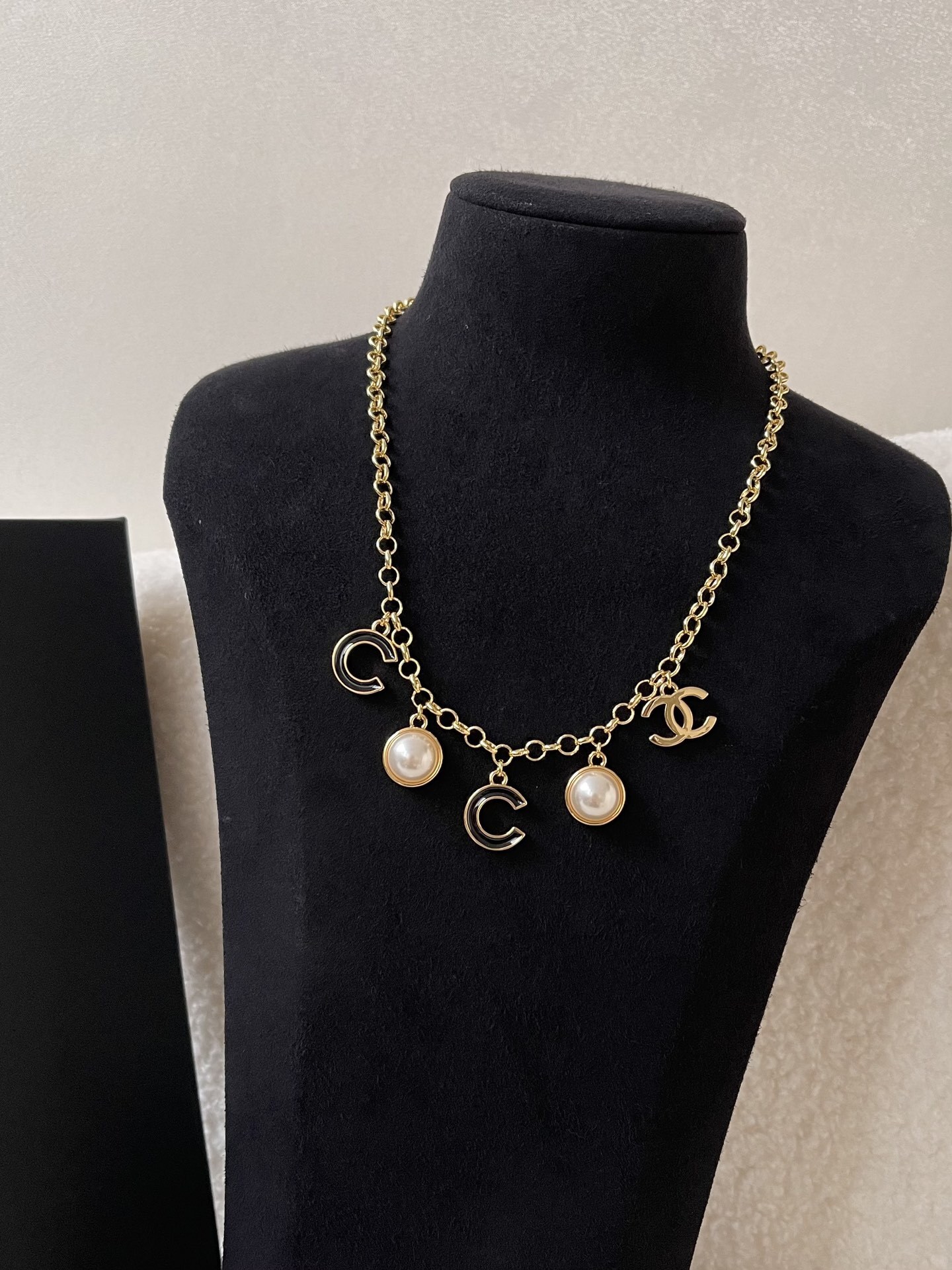 Chanel Luxury Gold Charm Necklace with Pearls and Black Enamel CC