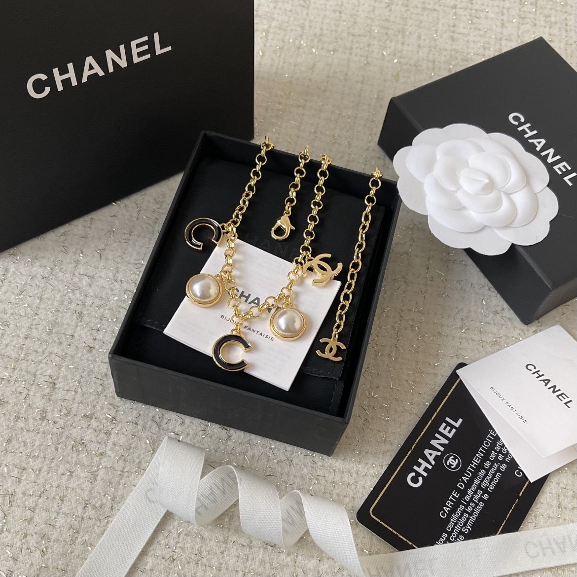 Chanel Luxury Gold Charm Necklace with Pearls and Black Enamel CC