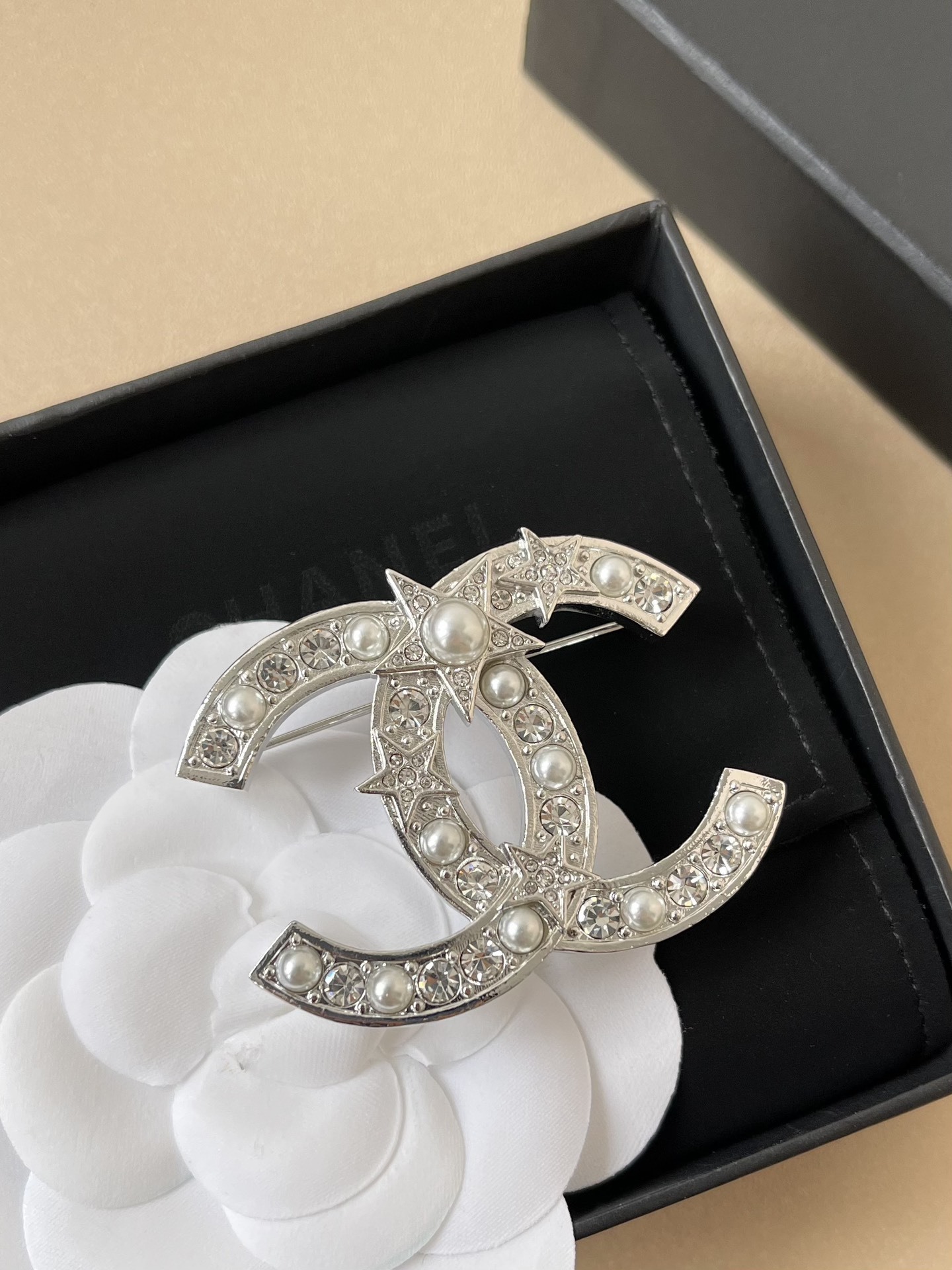 Elegant CC Logo Brooch with Crystal Stars and Faux Pearls