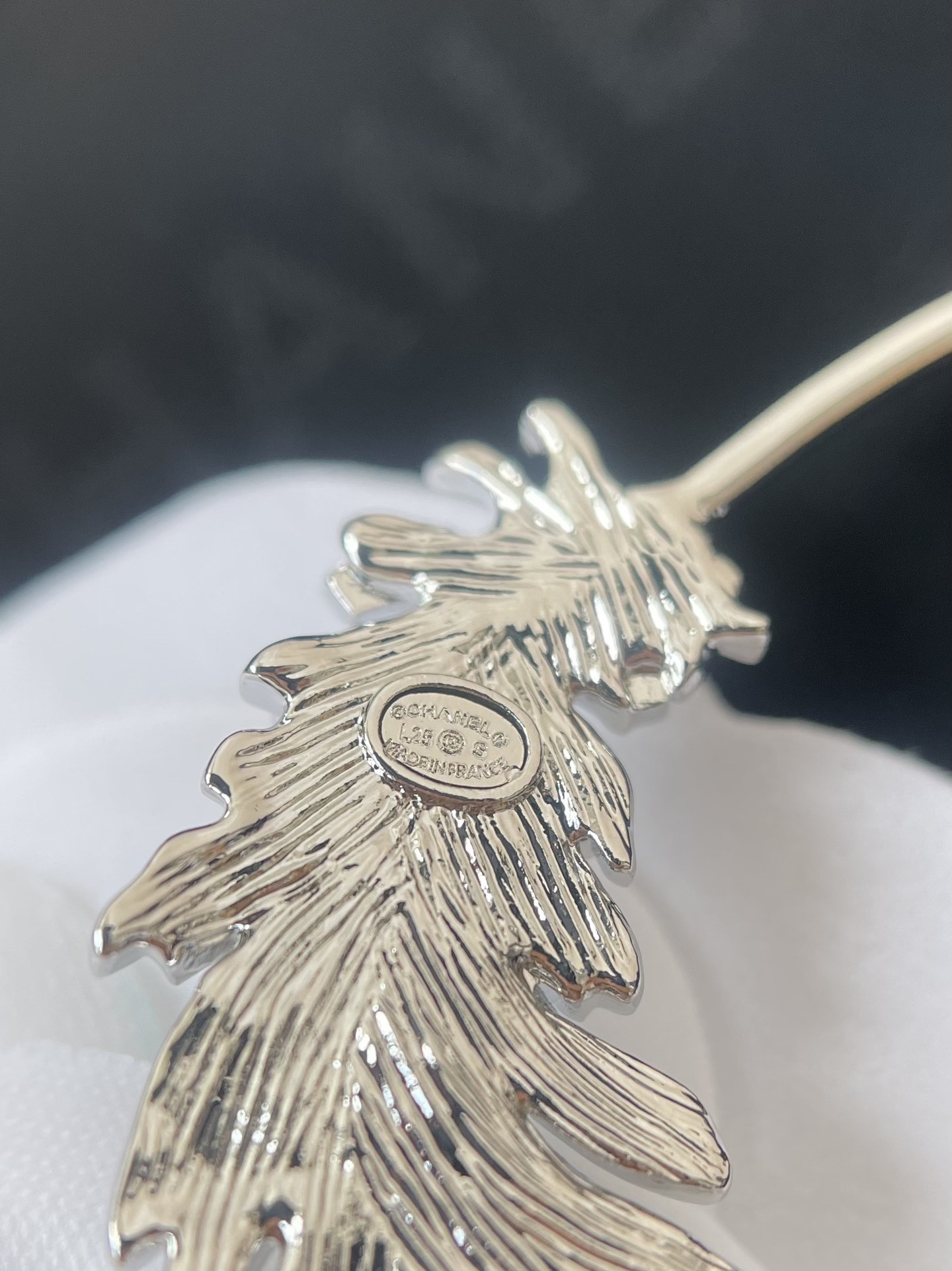 Chanel 2025 Spring/Summer Feather Ear Cuff - Silver & Rhinestones