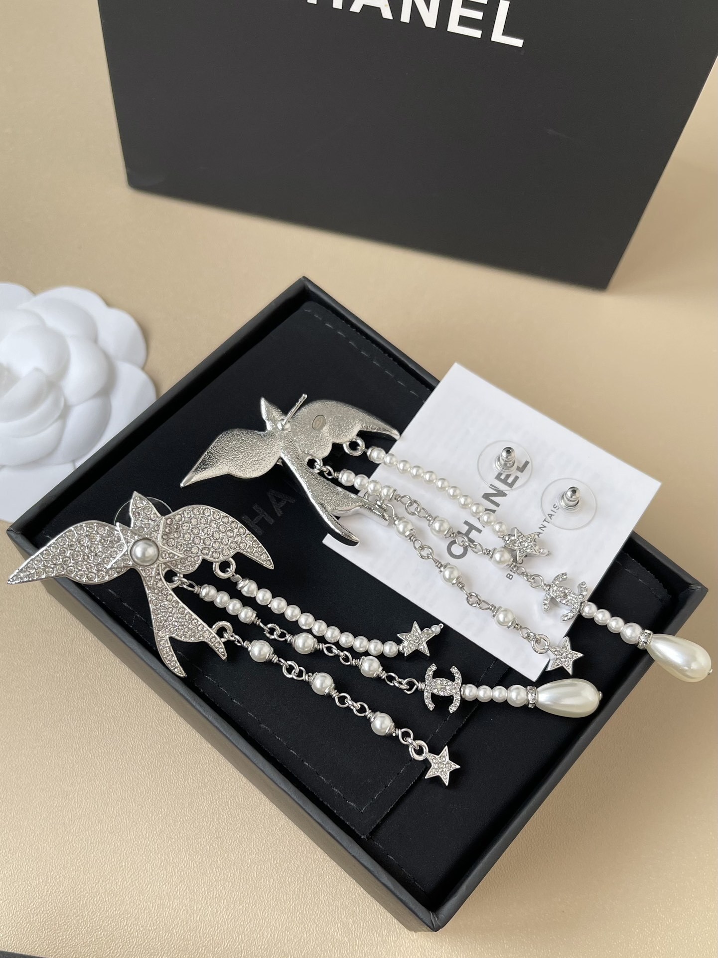 Chanel 2025 Crystal Bird & Pearl Drop Earrings Silver CC Logo