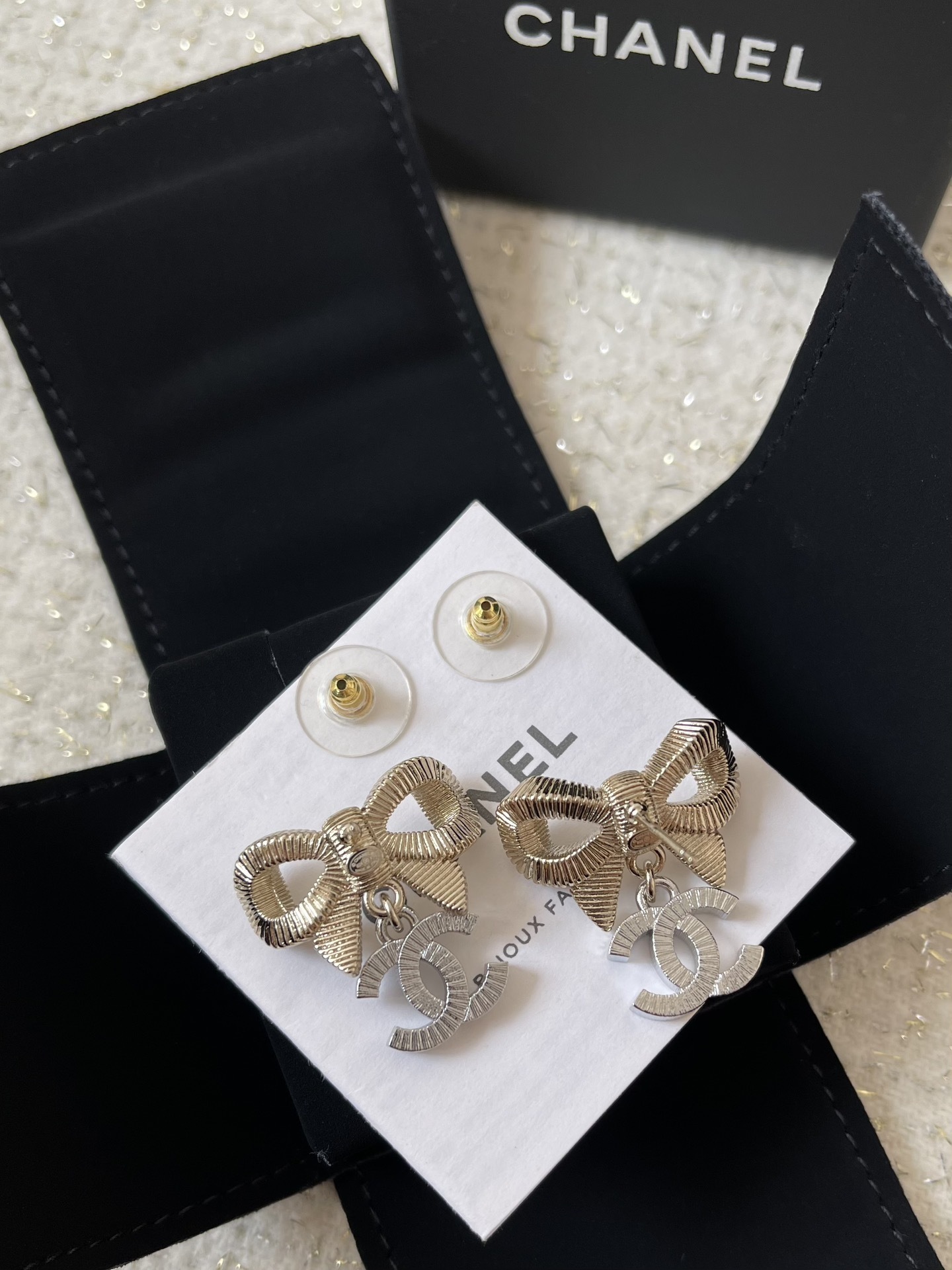 Elegant Gold Ribbon Bow Earrings with Crystal CC Dangle Charms