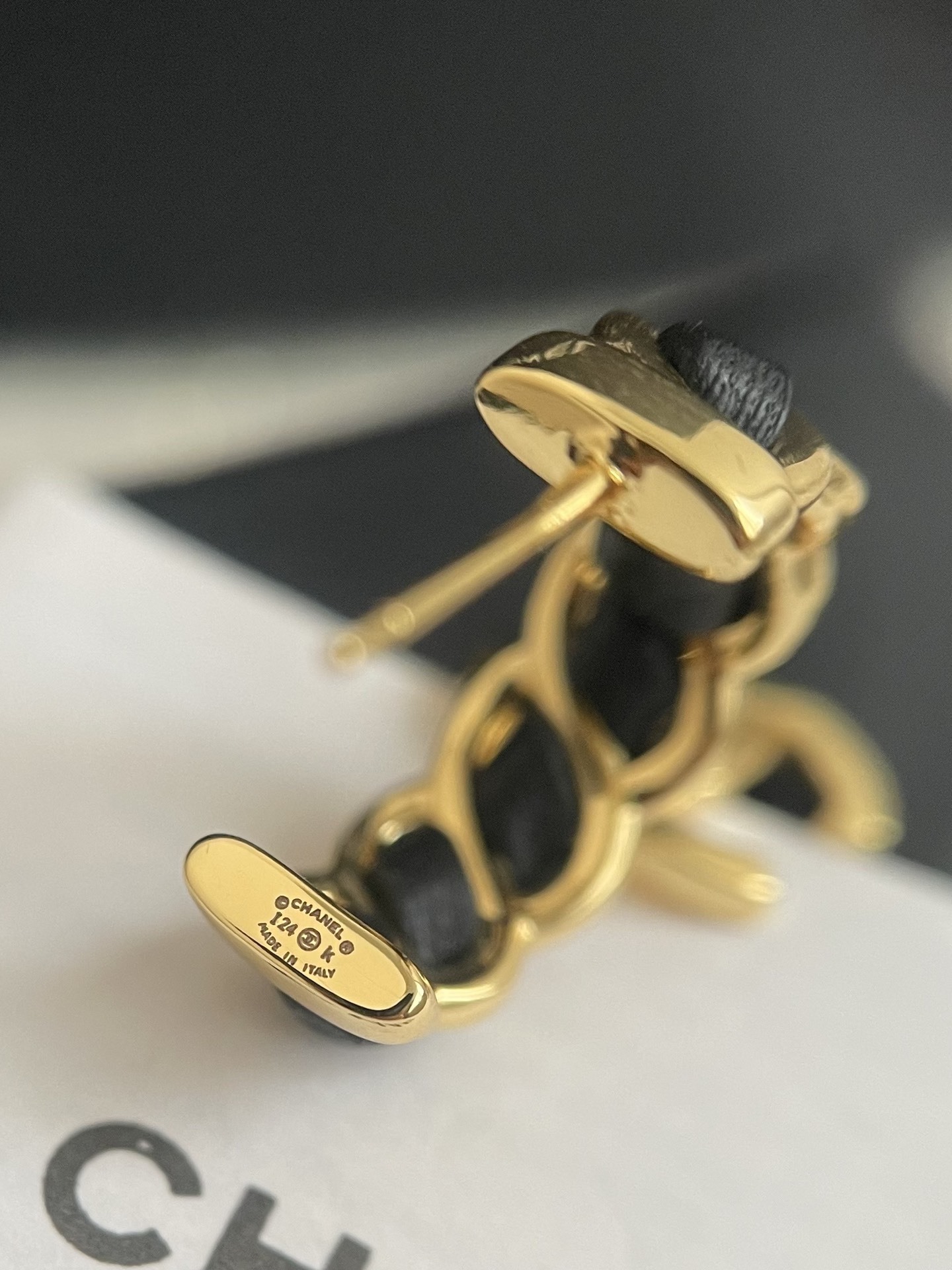 Elegant Gold-Tone CC Dangle Earrings with Interwoven Black Leather