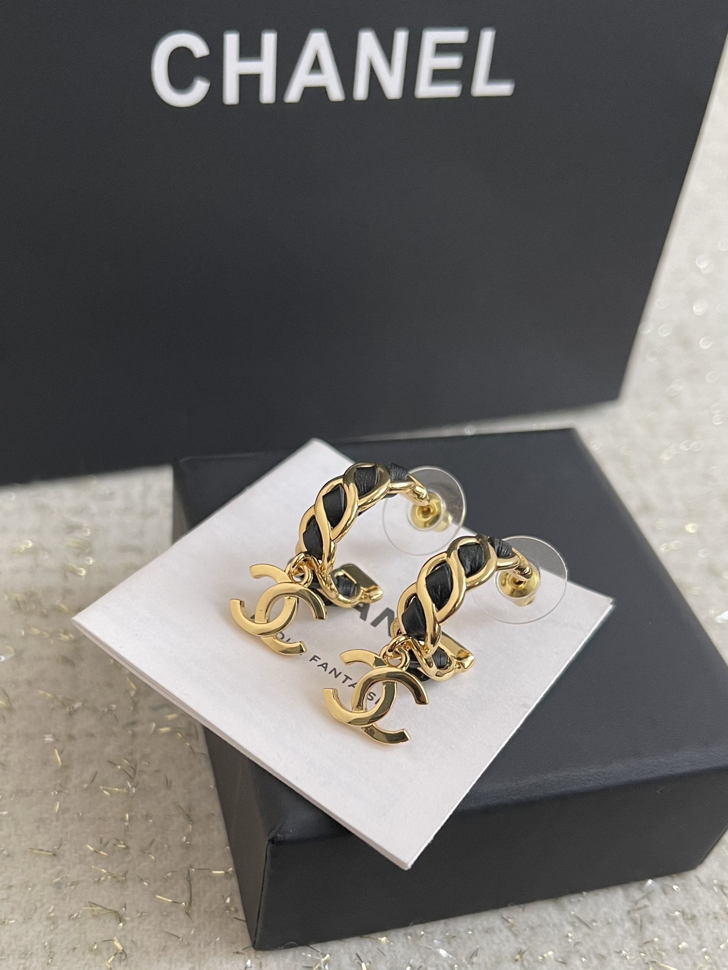 Elegant Gold-Tone CC Dangle Earrings with Interwoven Black Leather