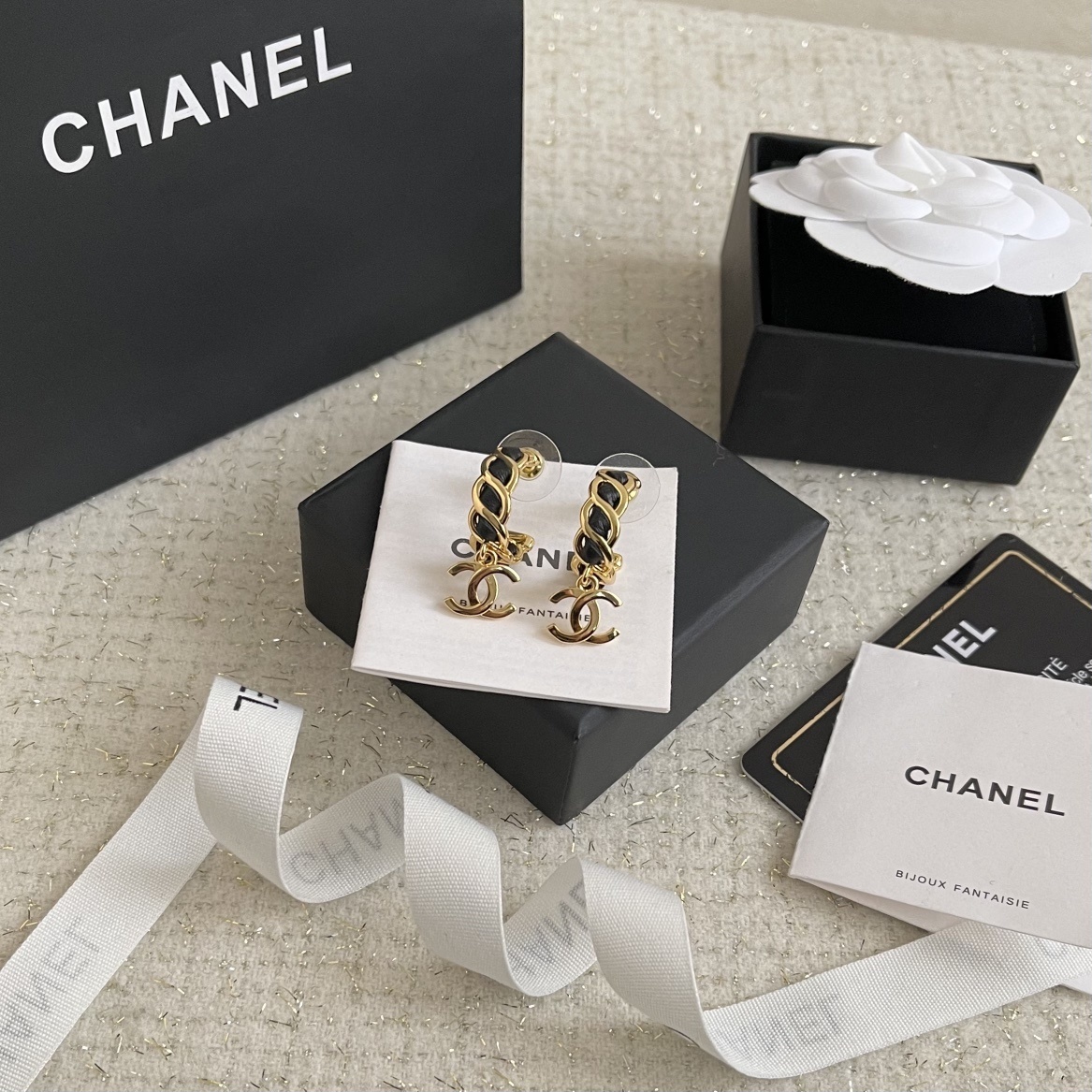 Elegant Gold-Tone CC Dangle Earrings with Interwoven Black Leather