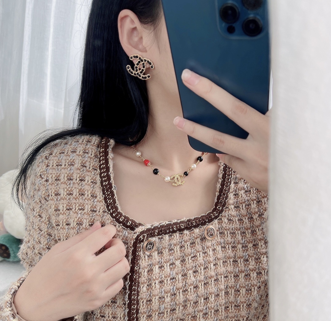 Elegant CC Logo Stud Earrings with Gold Metal and Black Leather