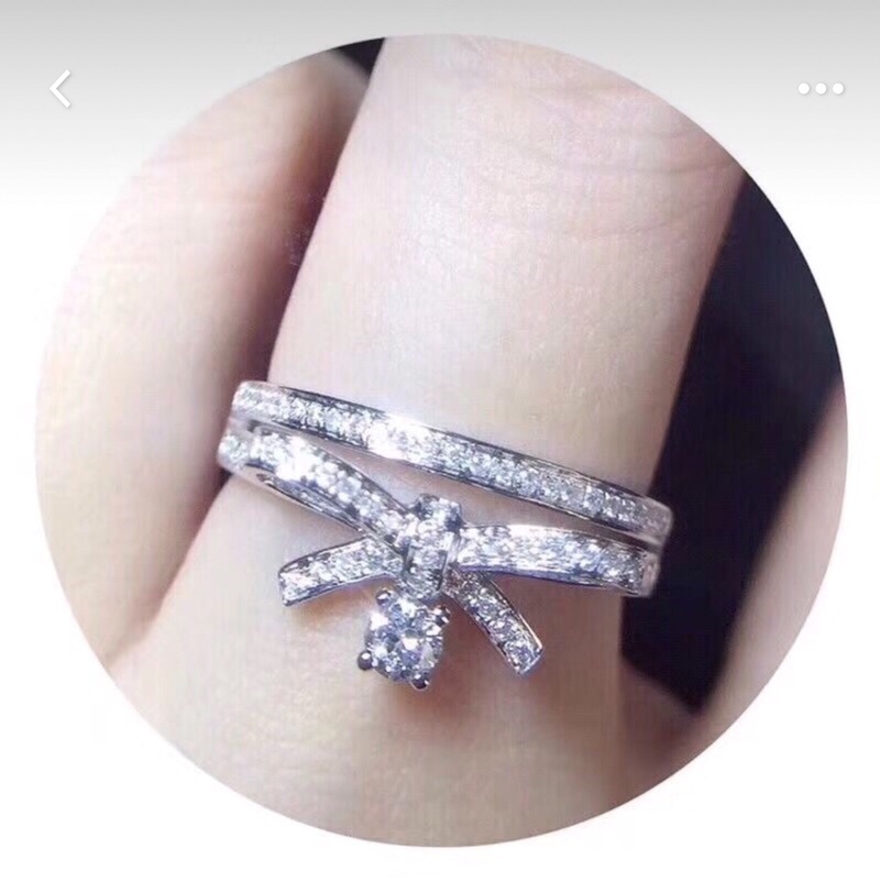 Elegant Silver Bow Knot Ring with Sparkling Zirconia Crystals