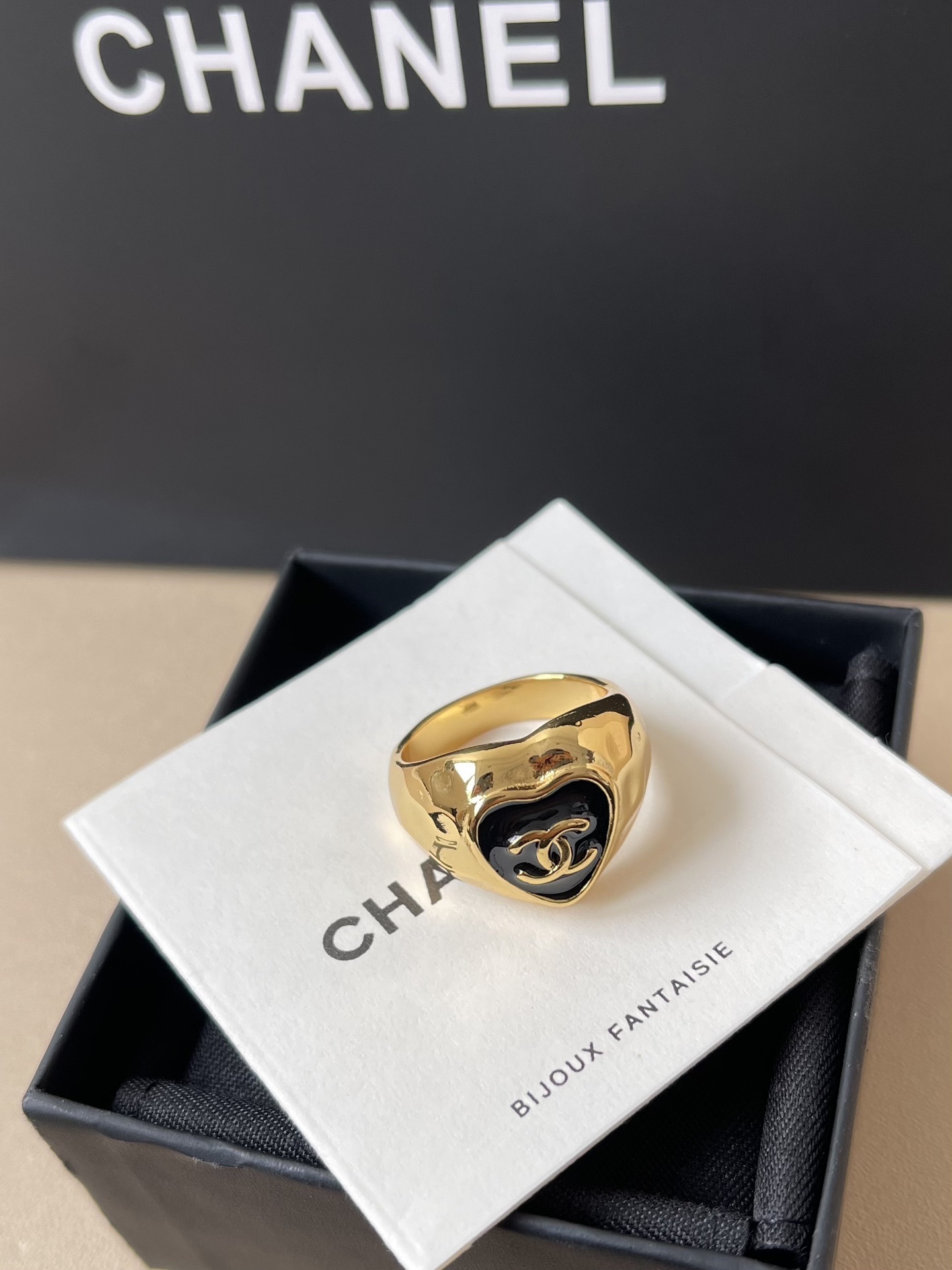 Luxury Gold Heart Ring with Black Enamel and Iconic CC Logo