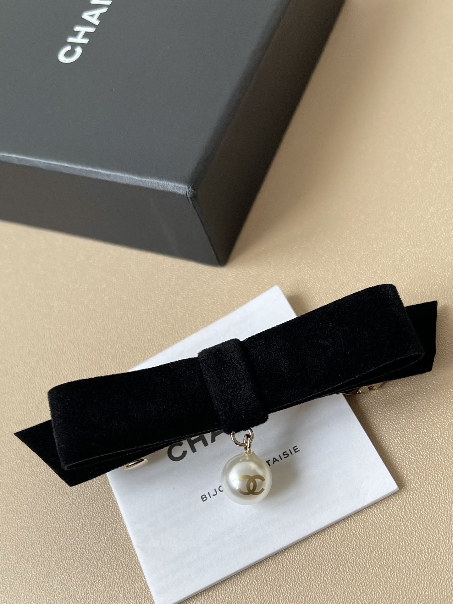 Elegant Chanel Black Velvet Bow Hair Clip with CC Pearl Drop