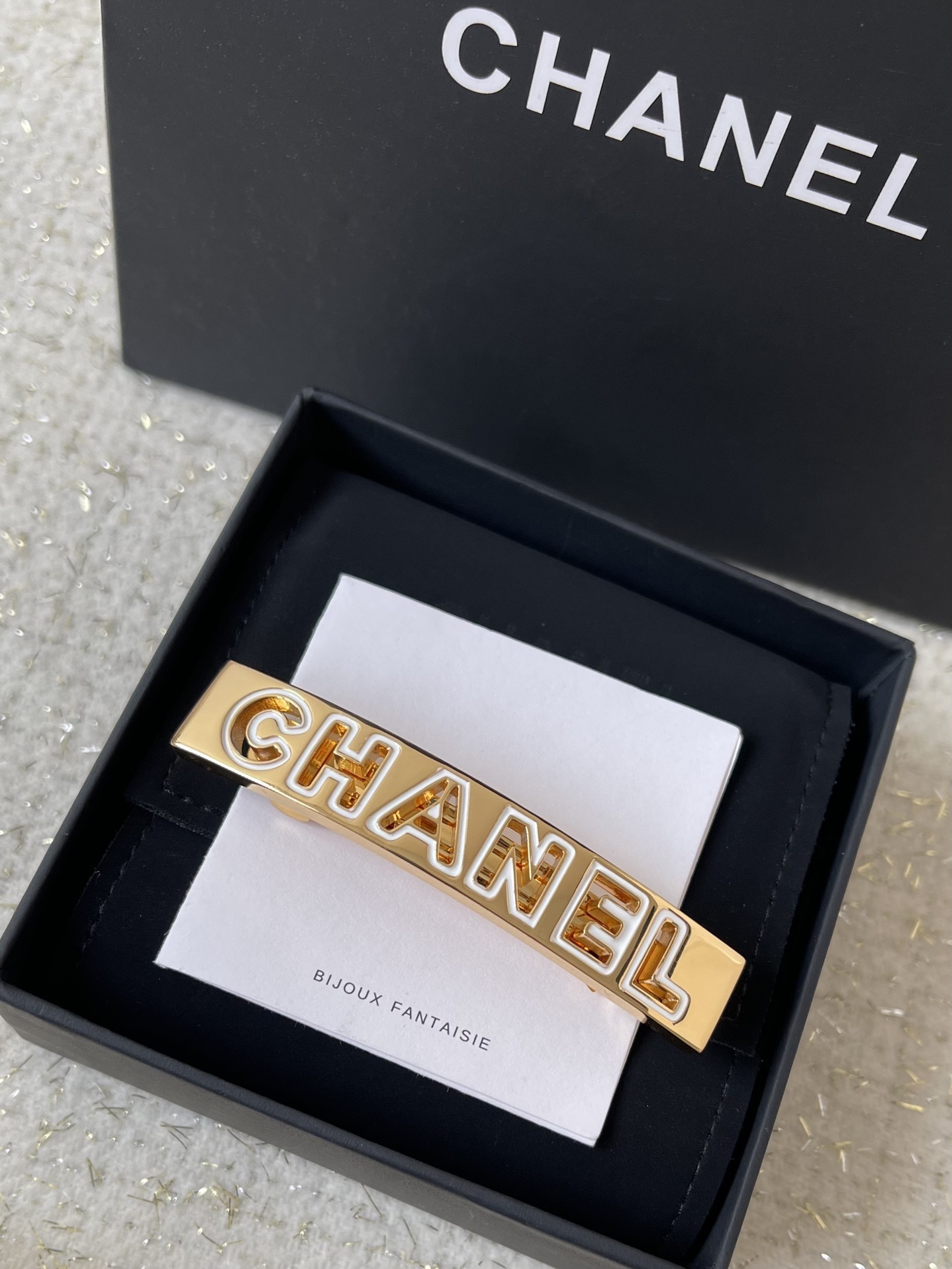 Elegant Chanel Gold Hair Barrette with White Enamel Lettering