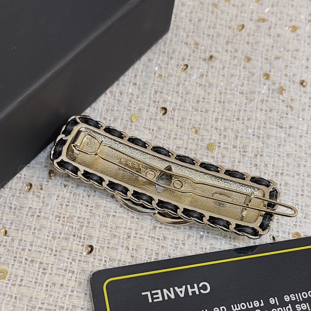 Luxury Crystal Logo Hair Clip with Interwoven Leather Chain