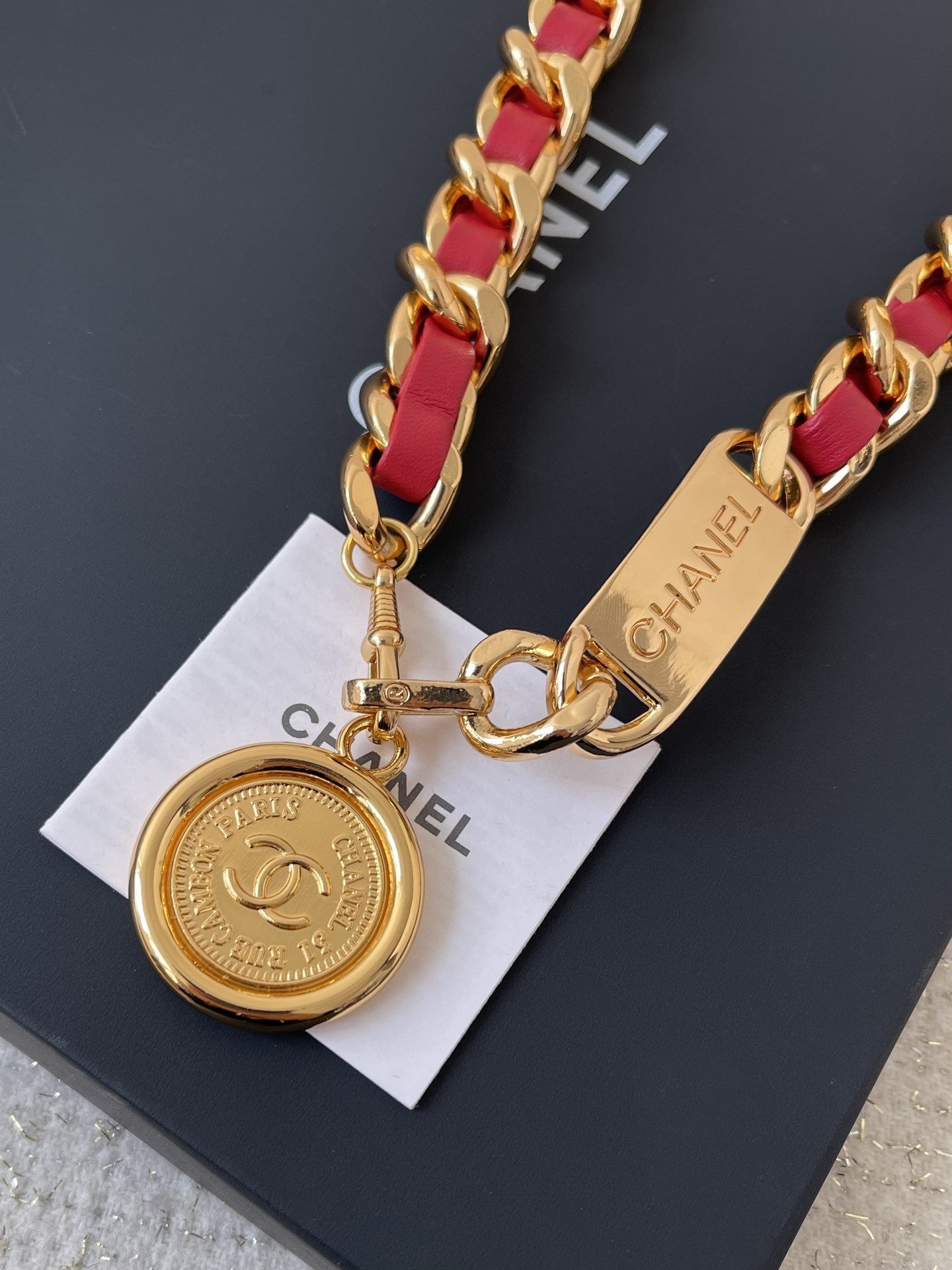 Luxury Gold Chain Belt with Red Leather & Logo Medallion Charm