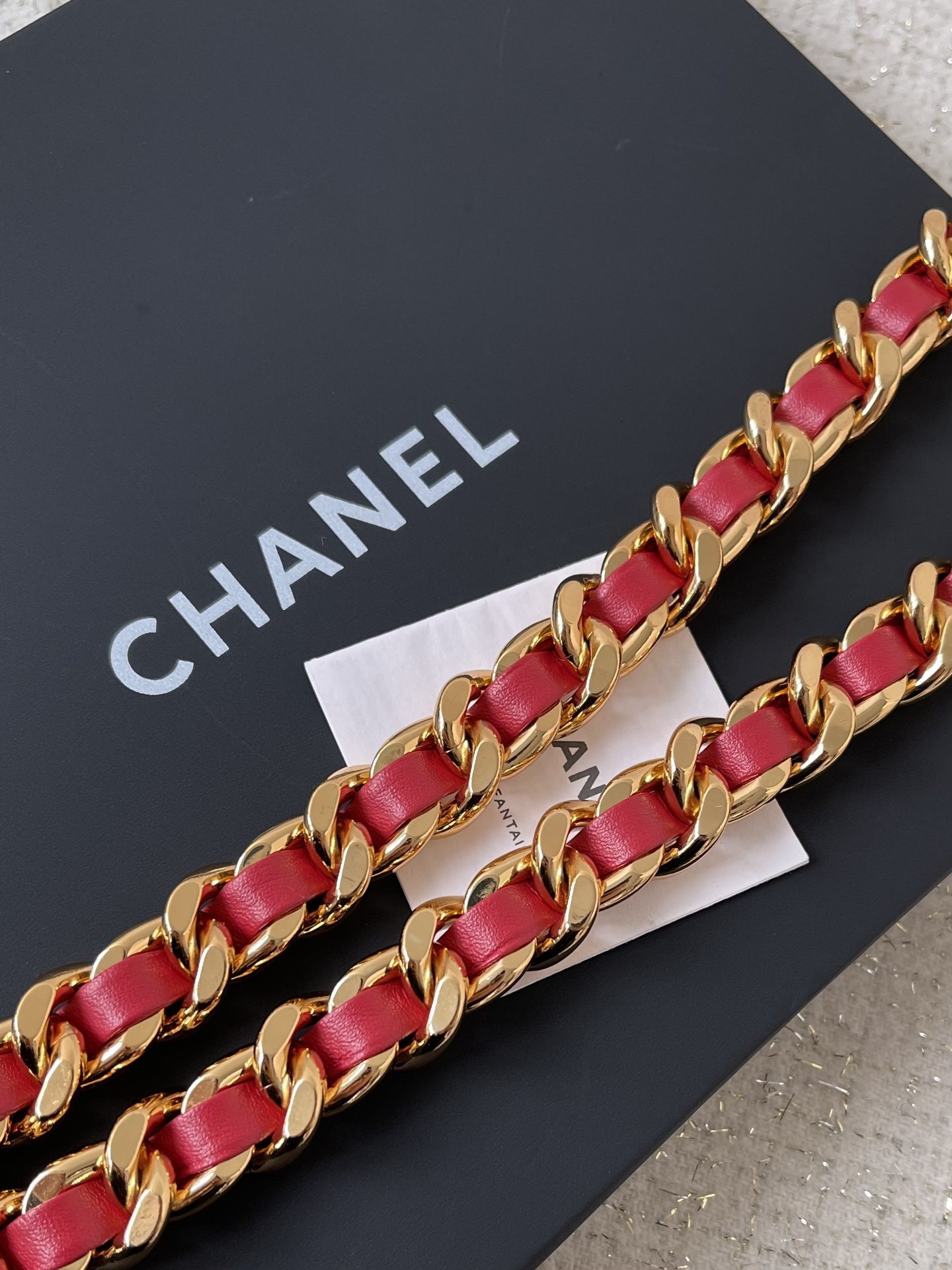 Luxury Gold Chain Belt with Red Leather & Logo Medallion Charm
