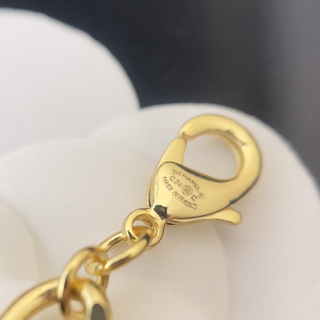 Chanel Gold-Tone Chain Belt with Crystal Lettering & Roller Skate