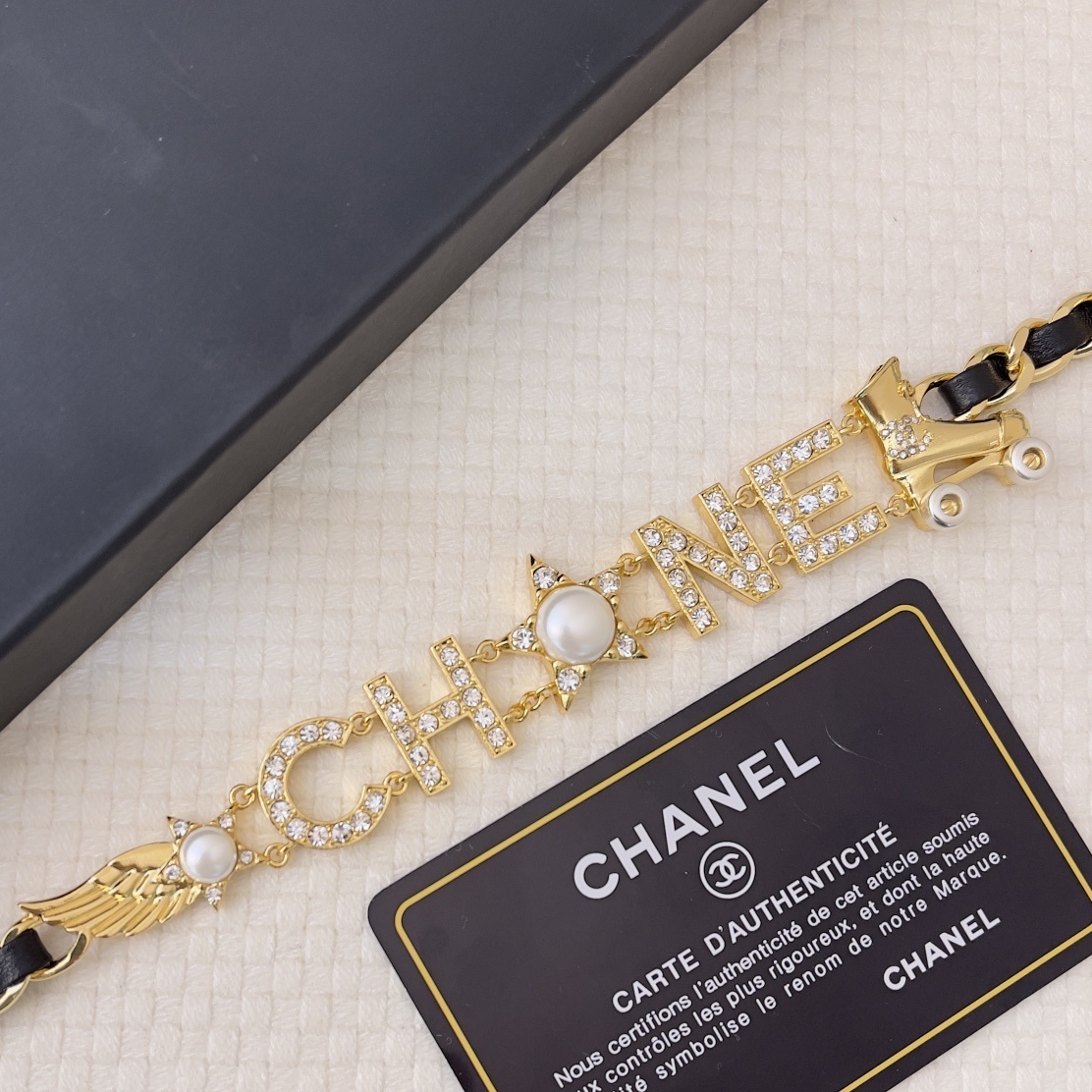Chanel Gold-Tone Chain Belt with Crystal Lettering & Roller Skate