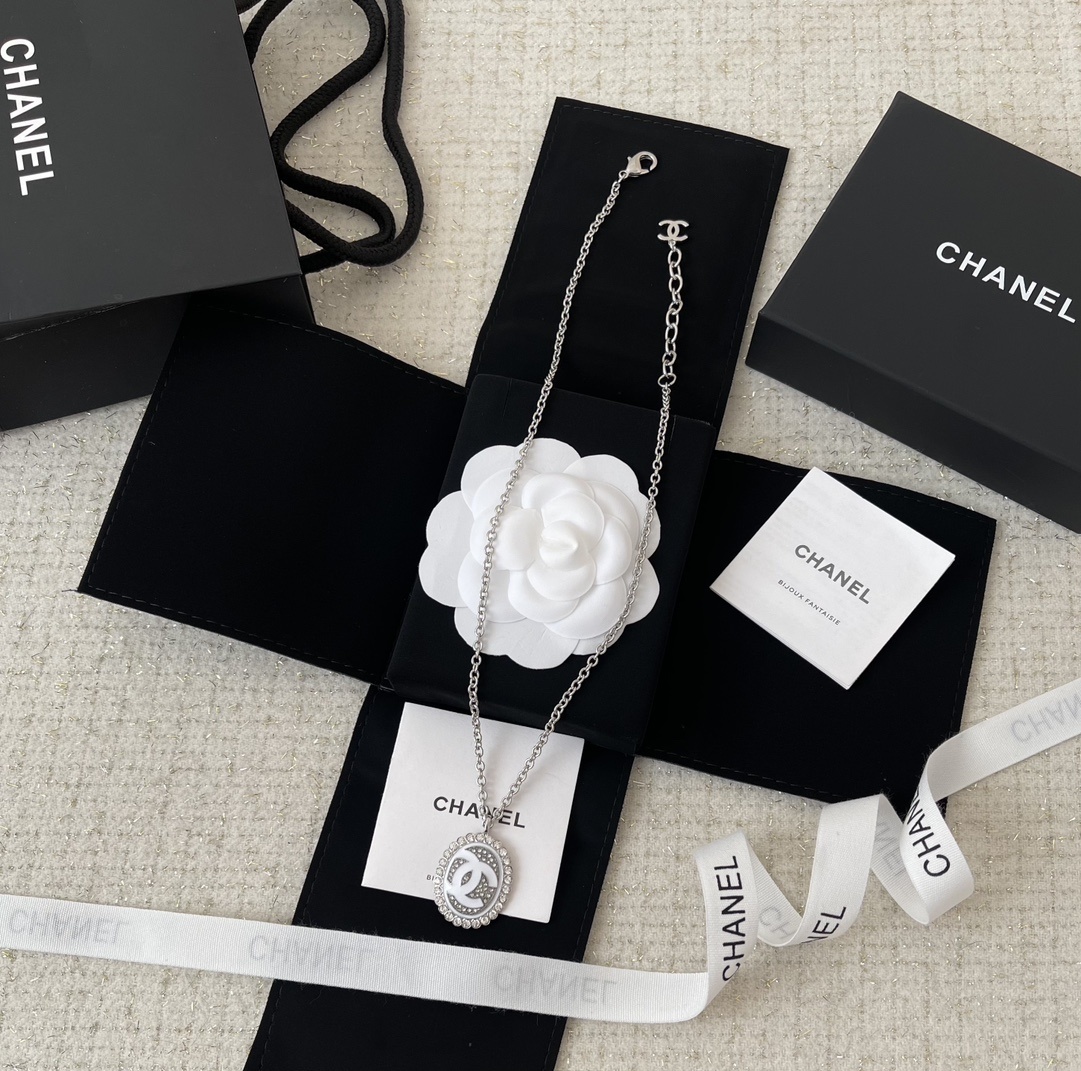 Elegant Silver CC Pendant Necklace with Sparkling Crystals