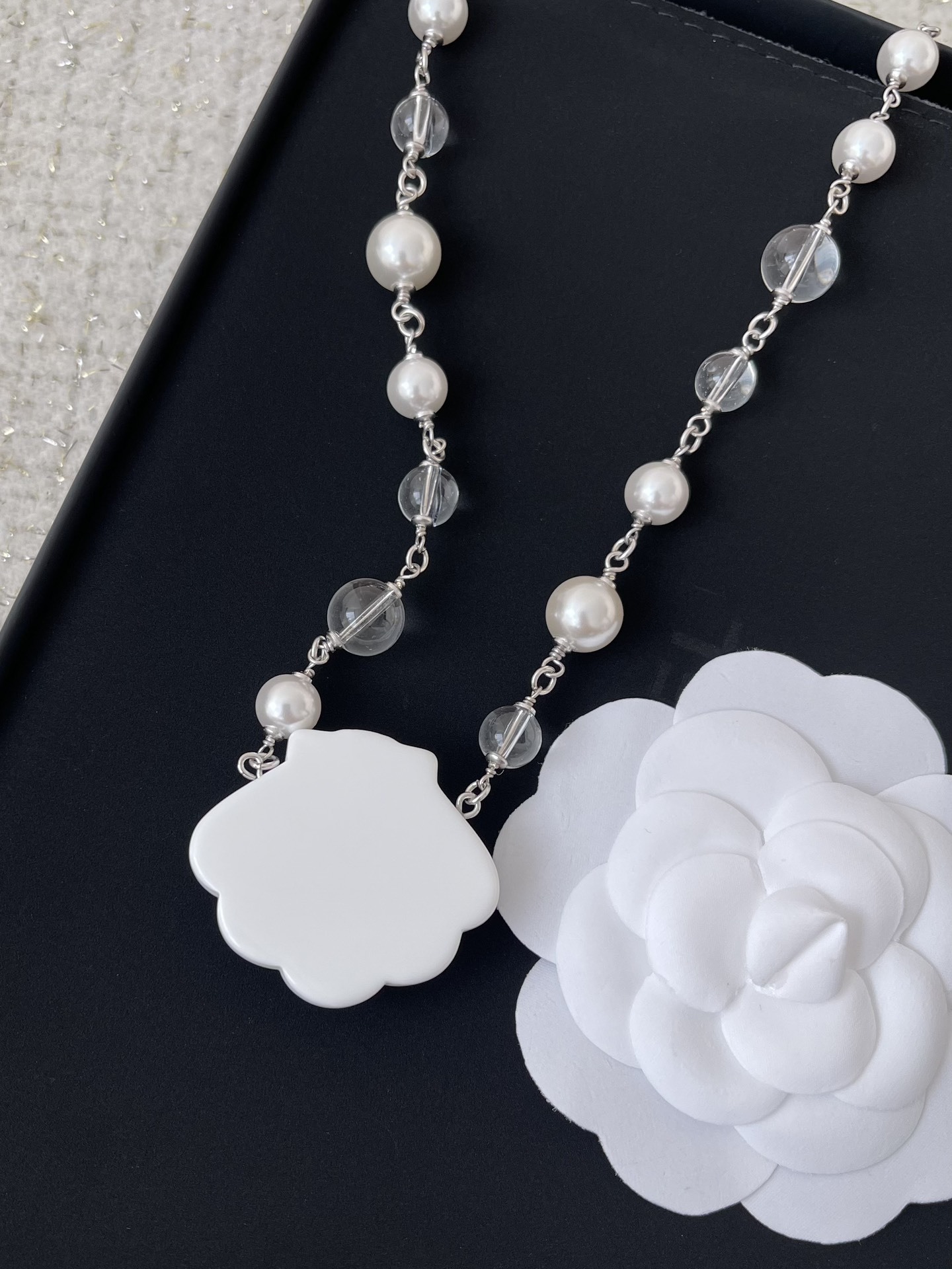 Elegant Pearl Necklace with Glitter Shell Pendant and CC Logo